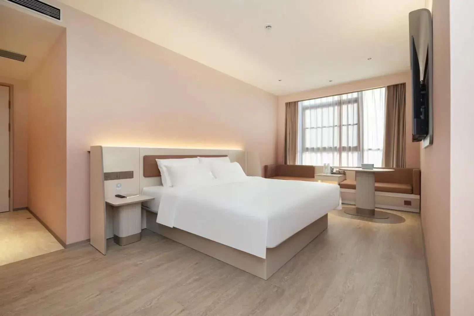 Bed in Hanting Hotel Shanghai Lingang New City Wanda Plaza Bed in Hanting Hotel Shanghai Lingang New City Wanda Plaza