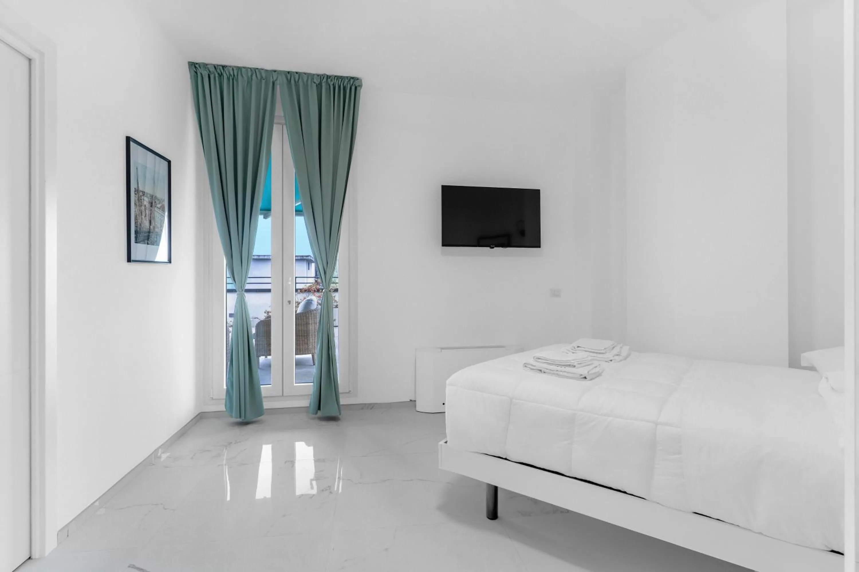 Photo of the whole room, Bed in Ponale Suites Foresteria Lombarda