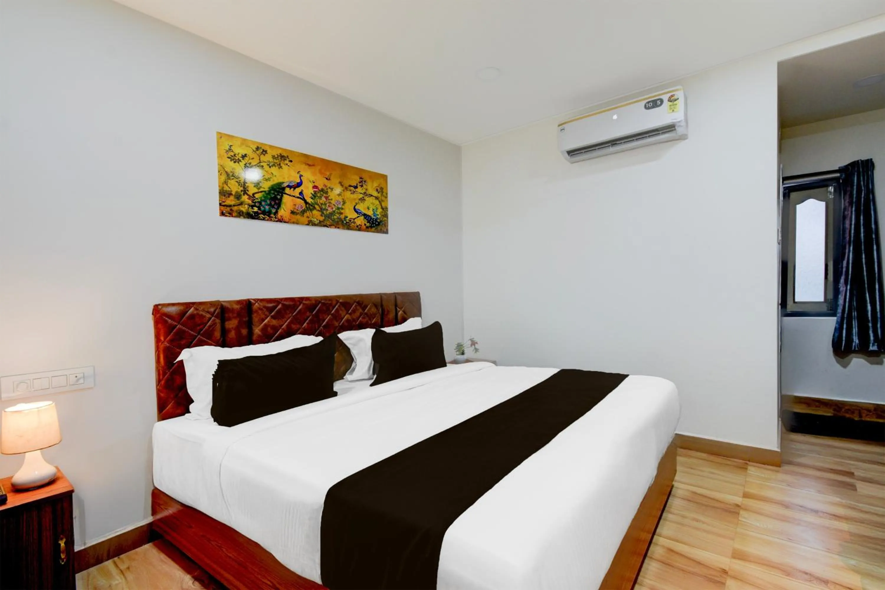 Bedroom, Bed in Super Townhouse Vanasthalipuram Near Deer National Park