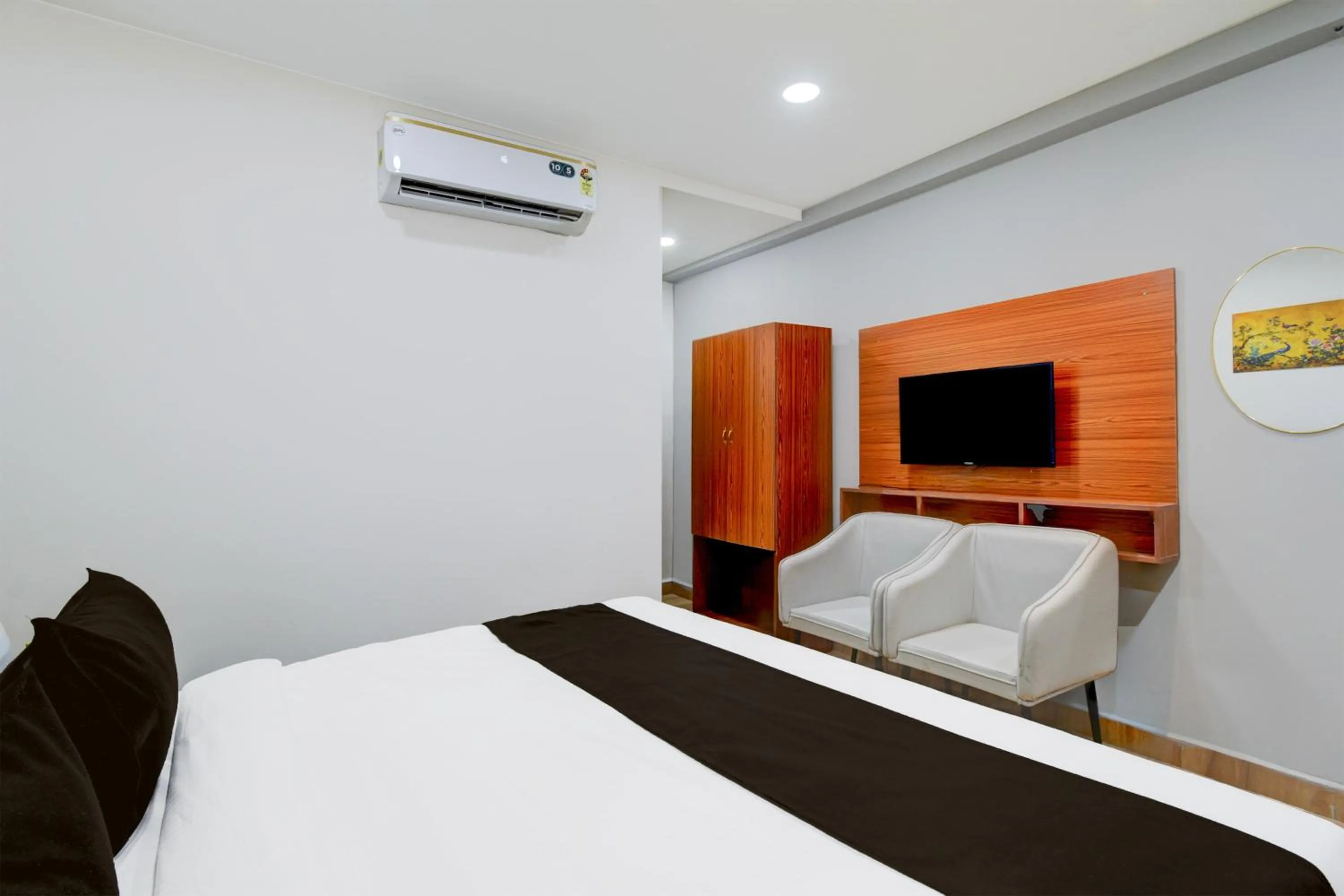 Bedroom, Bed in Super Townhouse Vanasthalipuram Near Deer National Park