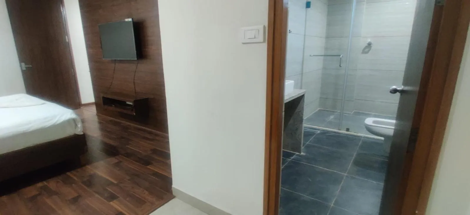 Bed in Hotel RN Grand