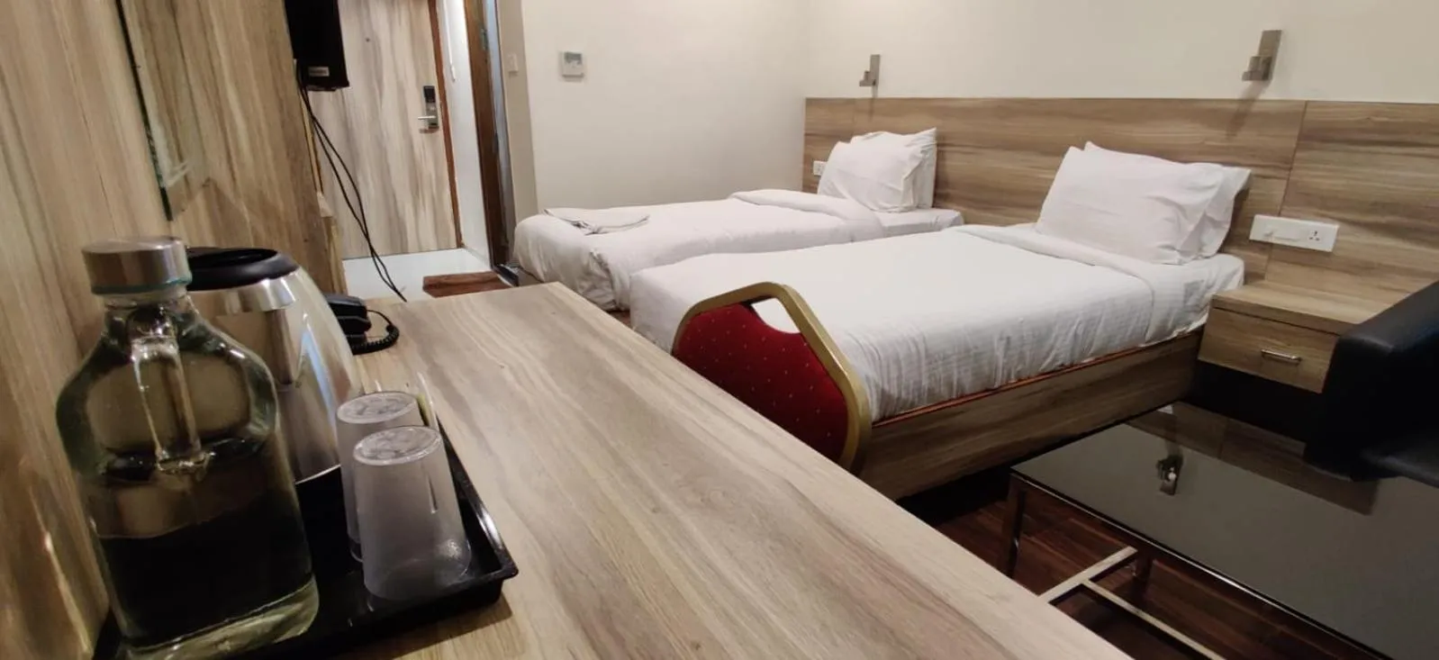 Bed in Hotel RN Grand