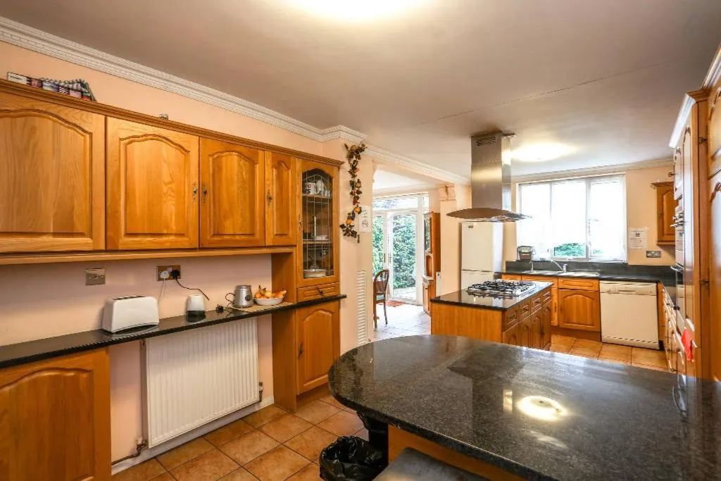 Kitchen or kitchenette in OYO Guest House Ellipse