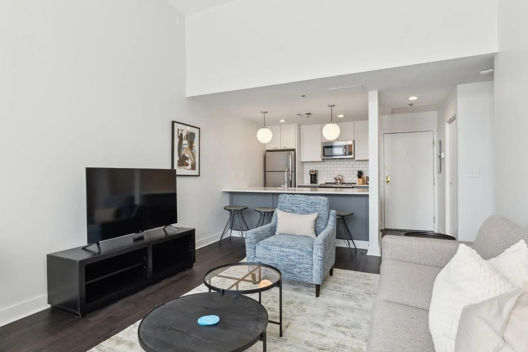 Living room in Placemakr Downtown Pittsburgh at The Pennsylvanian Living room in Placemakr Downtown Pittsburgh at The Pennsylvanian