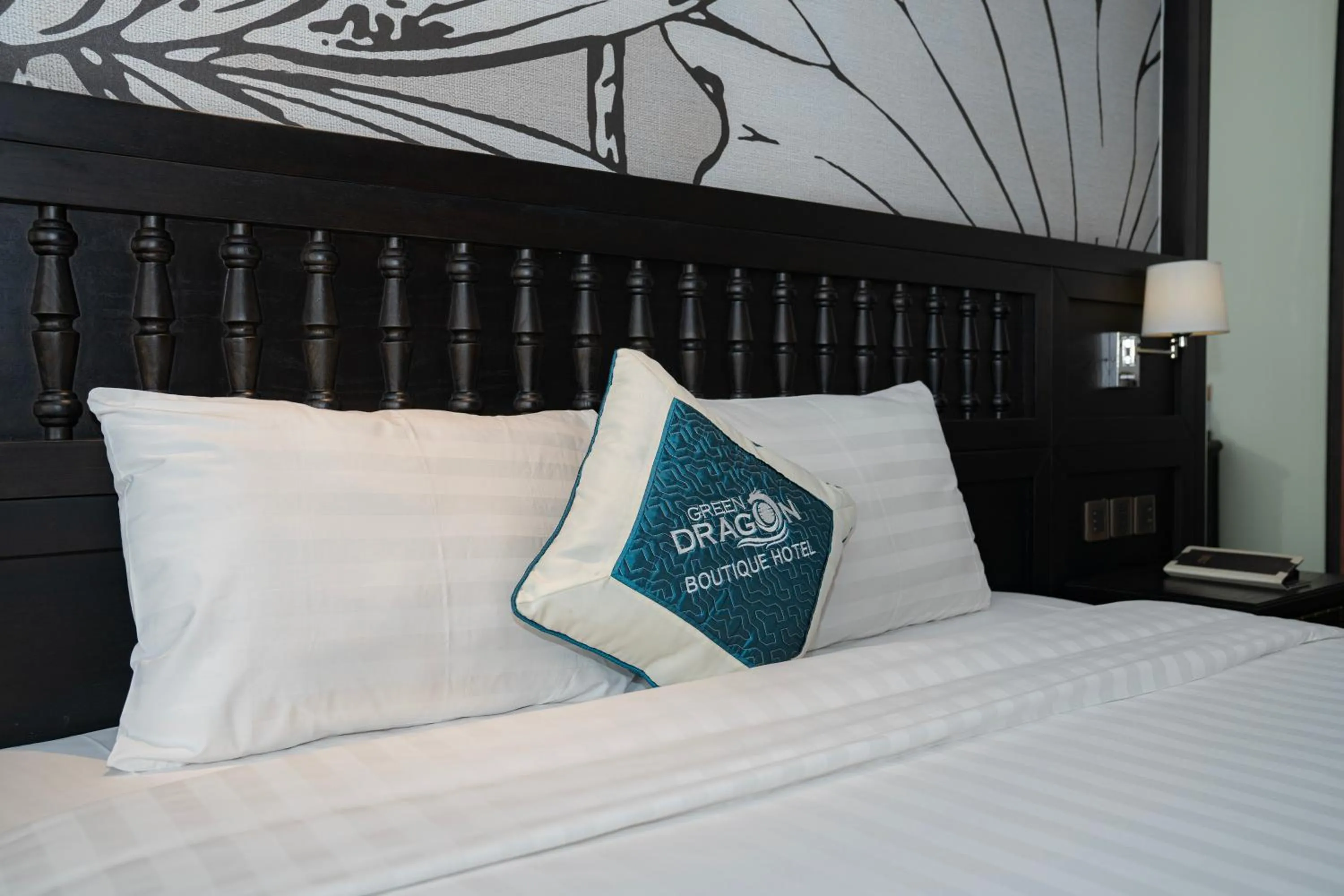 Bed in Green Dragon Boutique Hotel