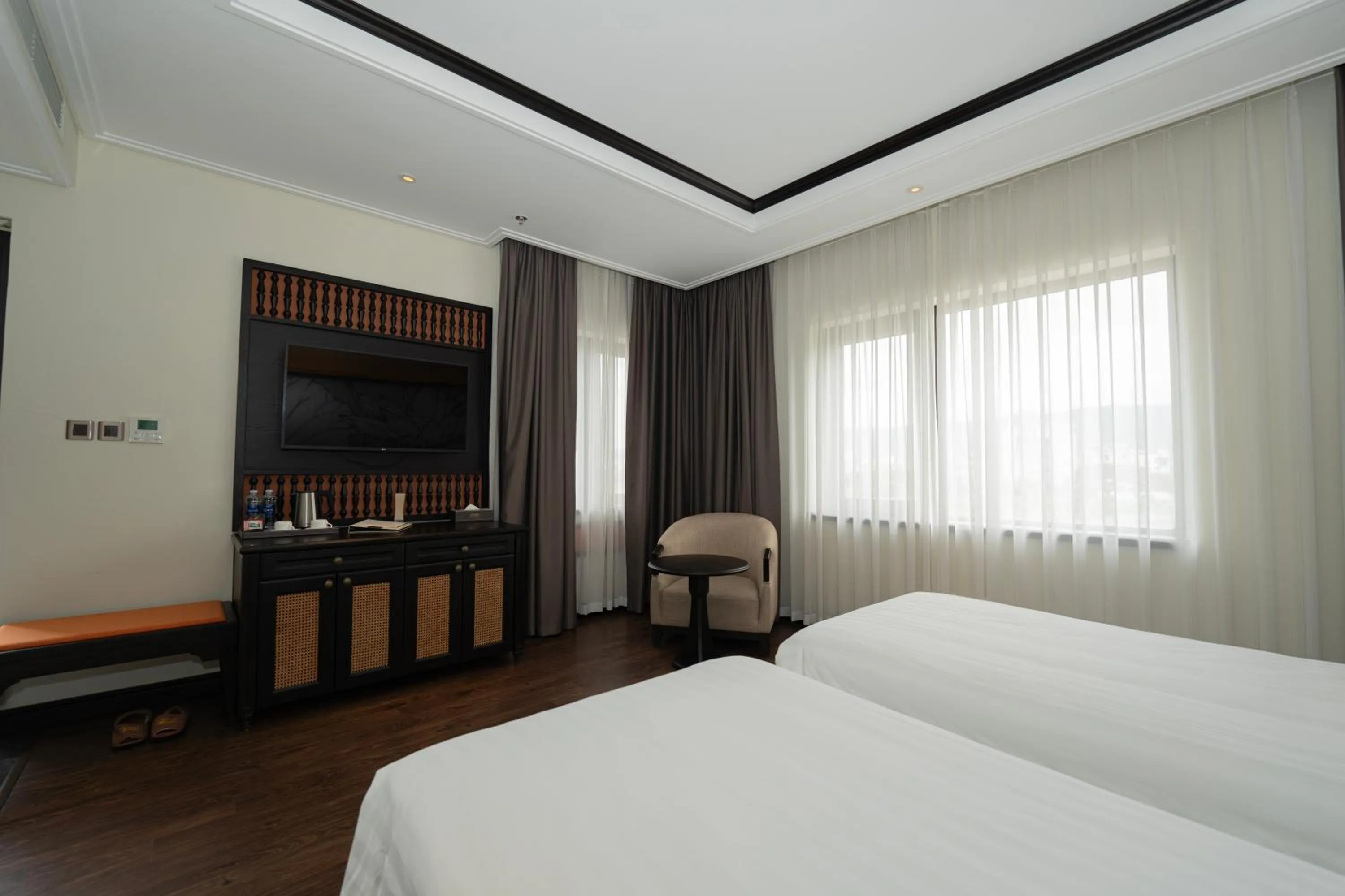 Bed in Green Dragon Boutique Hotel