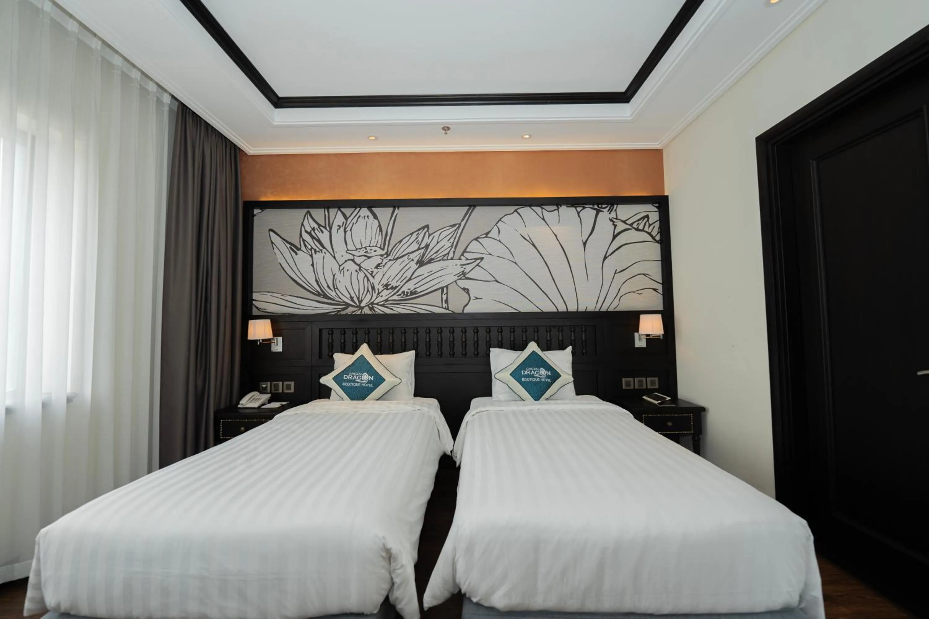 Bed in Green Dragon Boutique Hotel