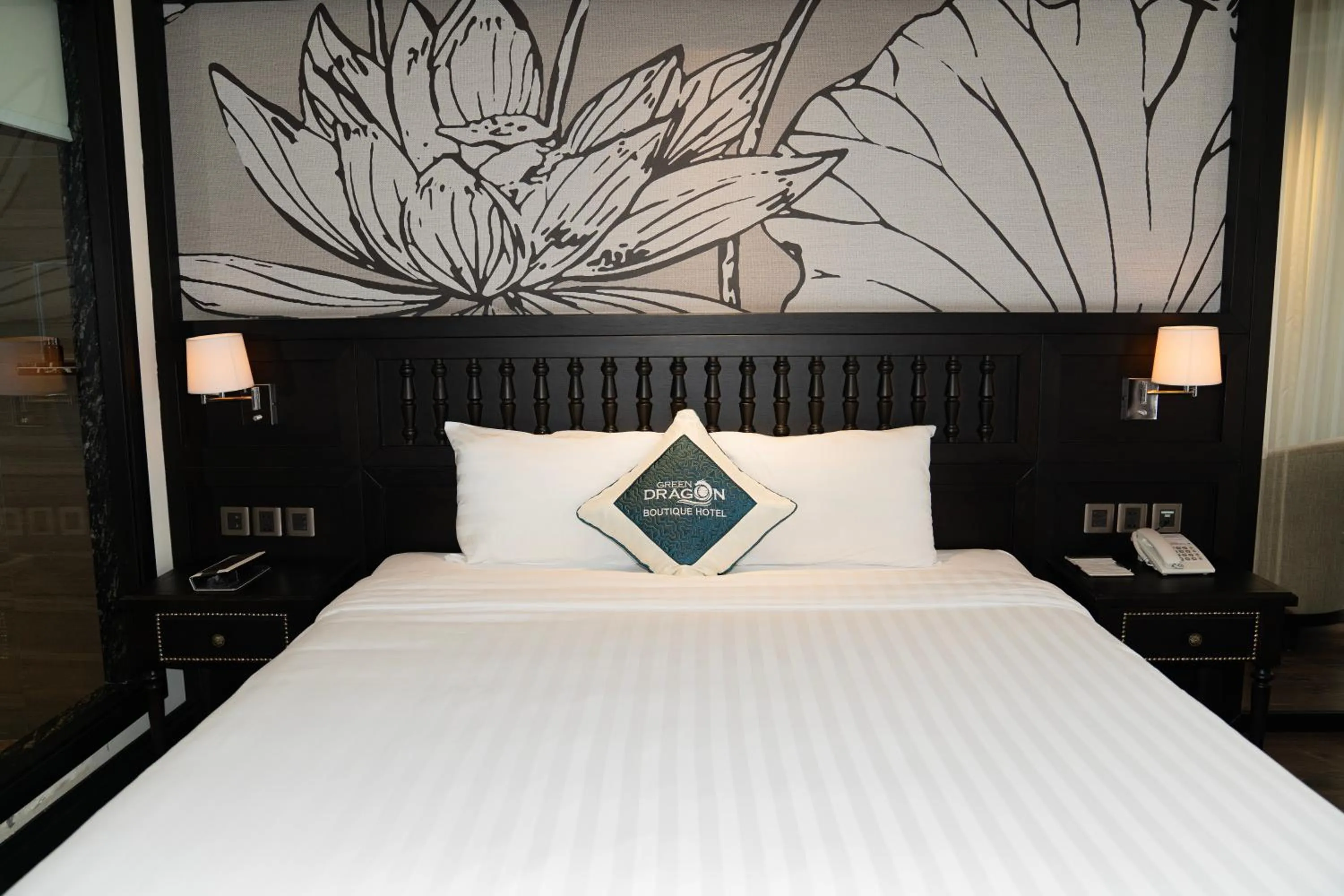 Bed in Green Dragon Boutique Hotel