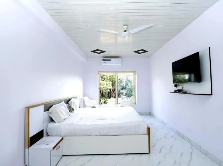 Bed in The Nature View Resort by Ohana