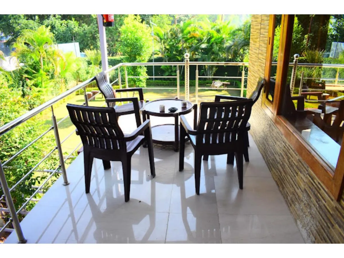 Seating area in The Nature View Resort by Ohana