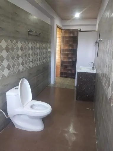 Toilet in The Nature View Resort by Ohana