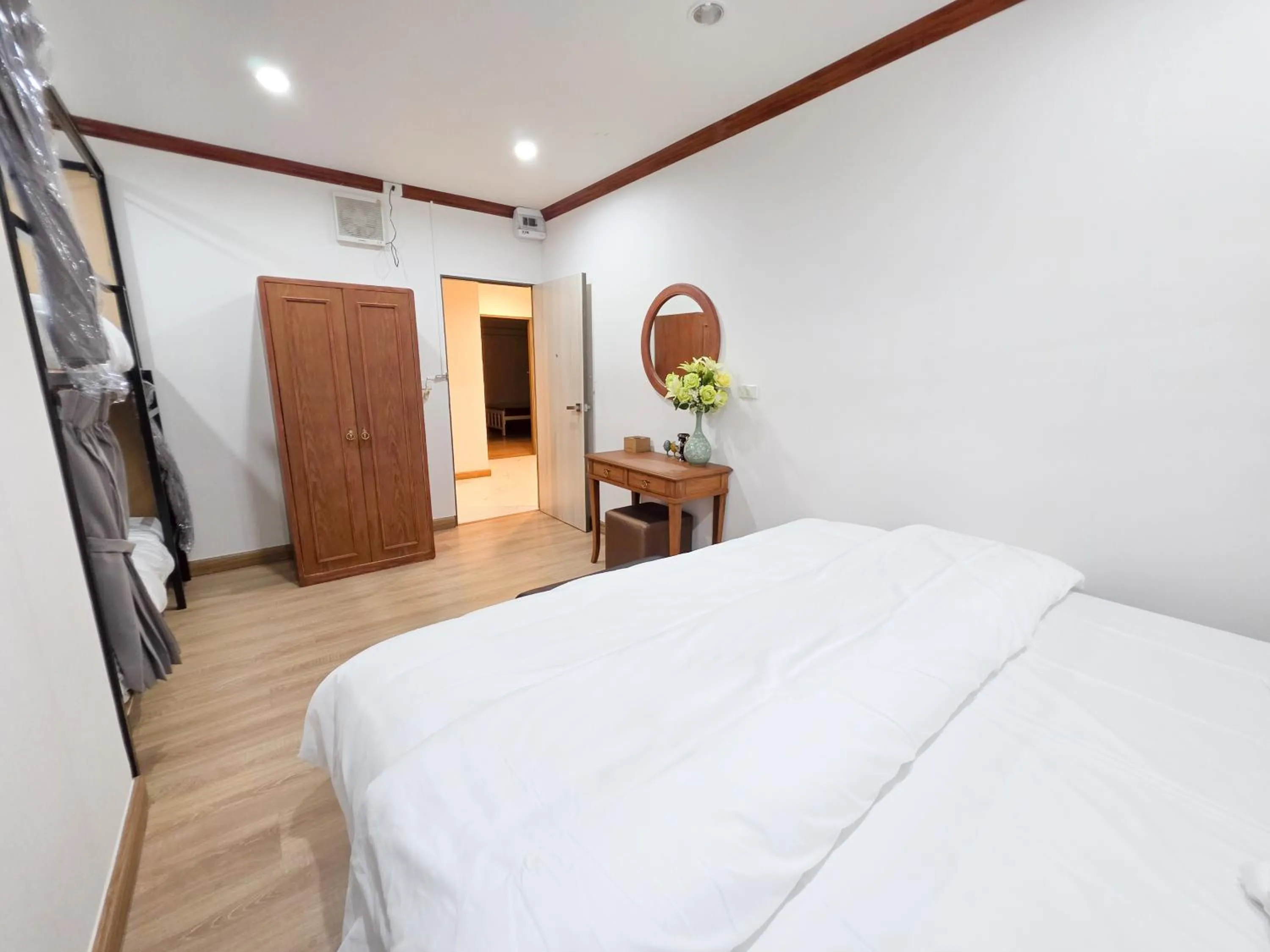 Bed in Vintana Siam Bangkok Hotel