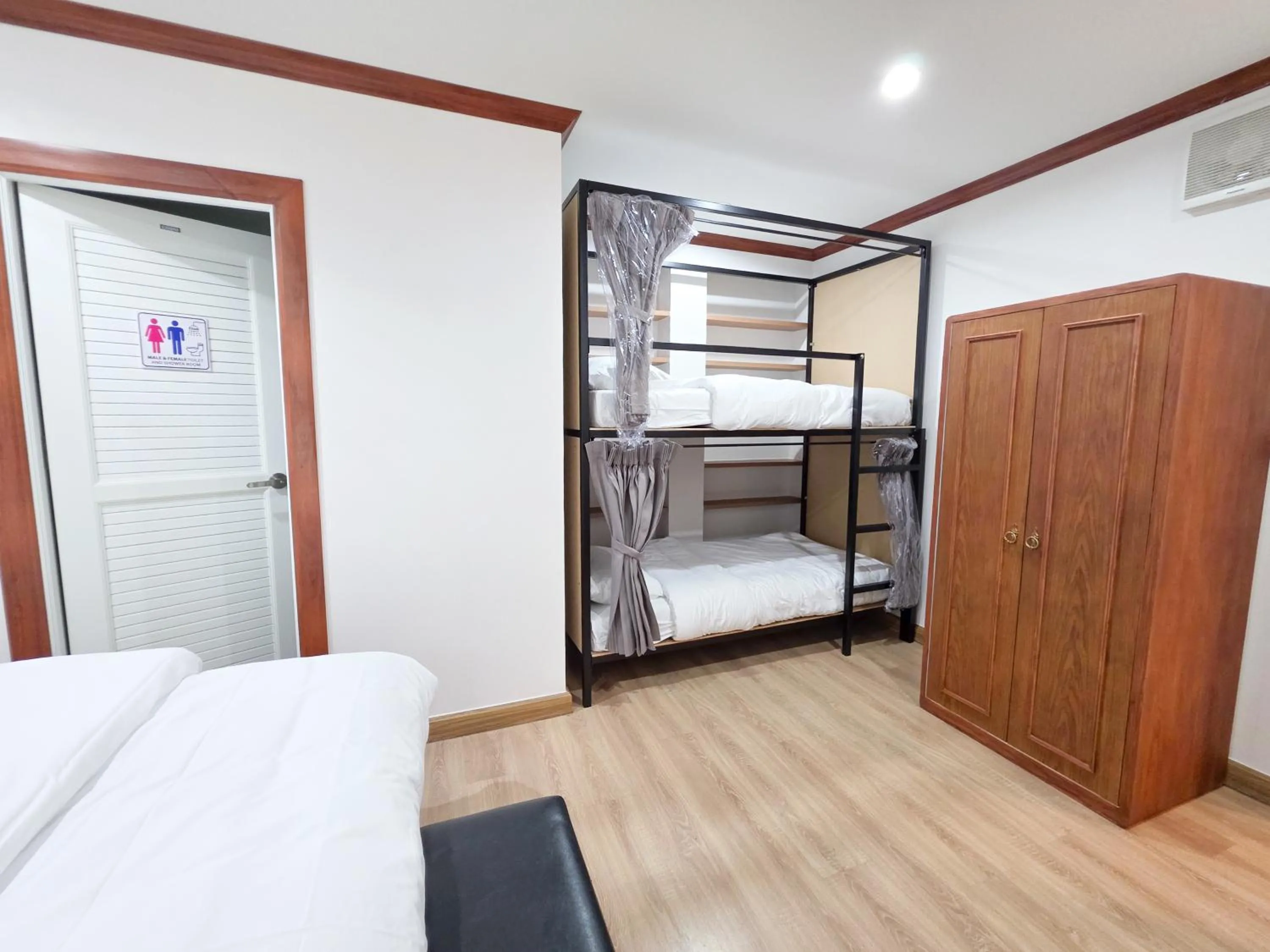 Bed in Vintana Siam Bangkok Hotel