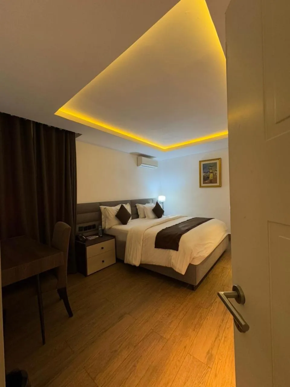 Bed in Bolton White Residence