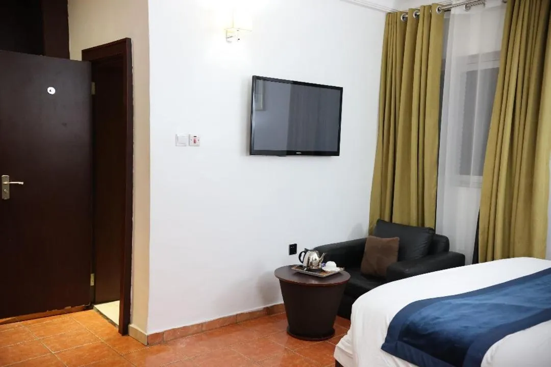 Bed in Bolton White Residence