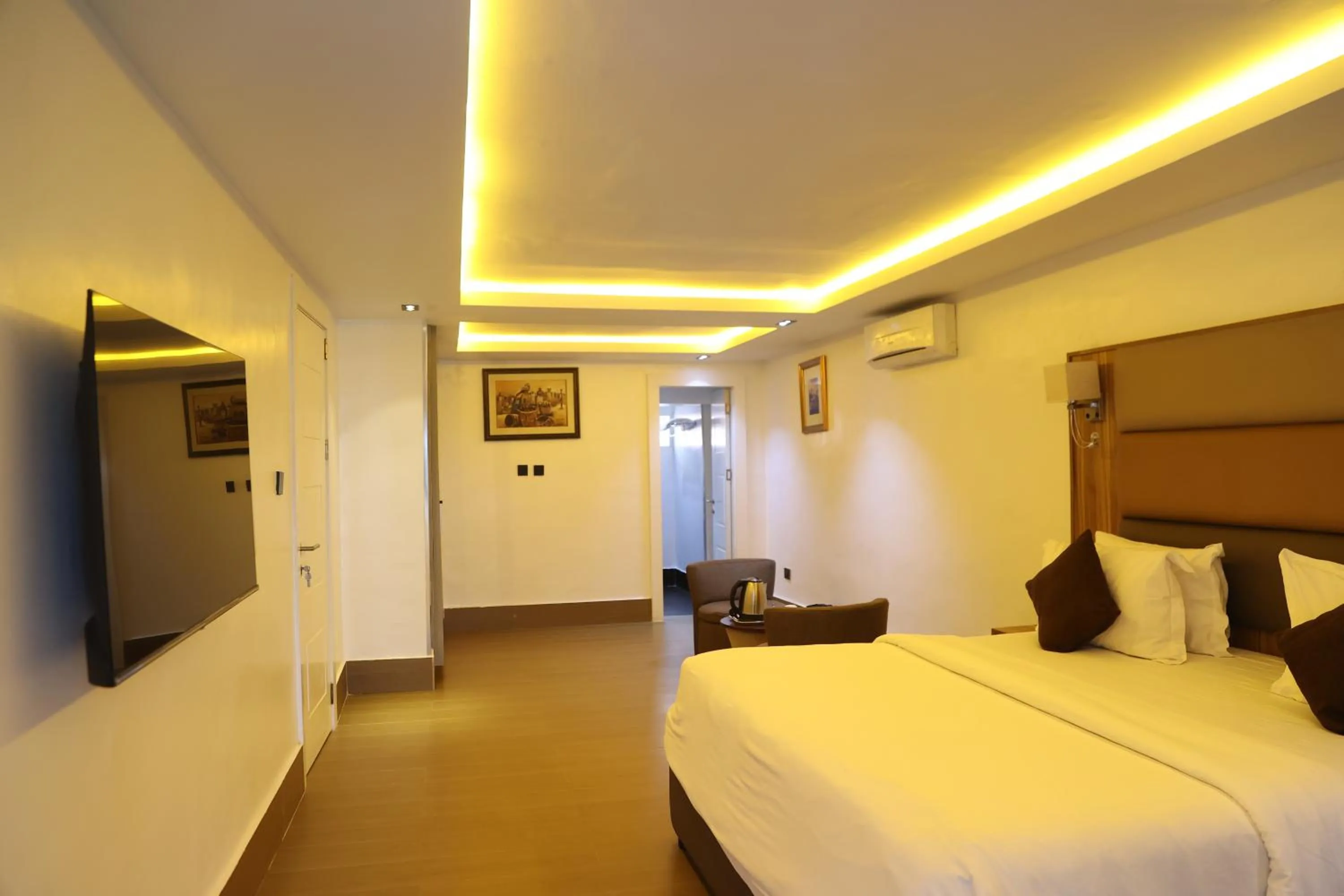 Bed in Bolton White Residence