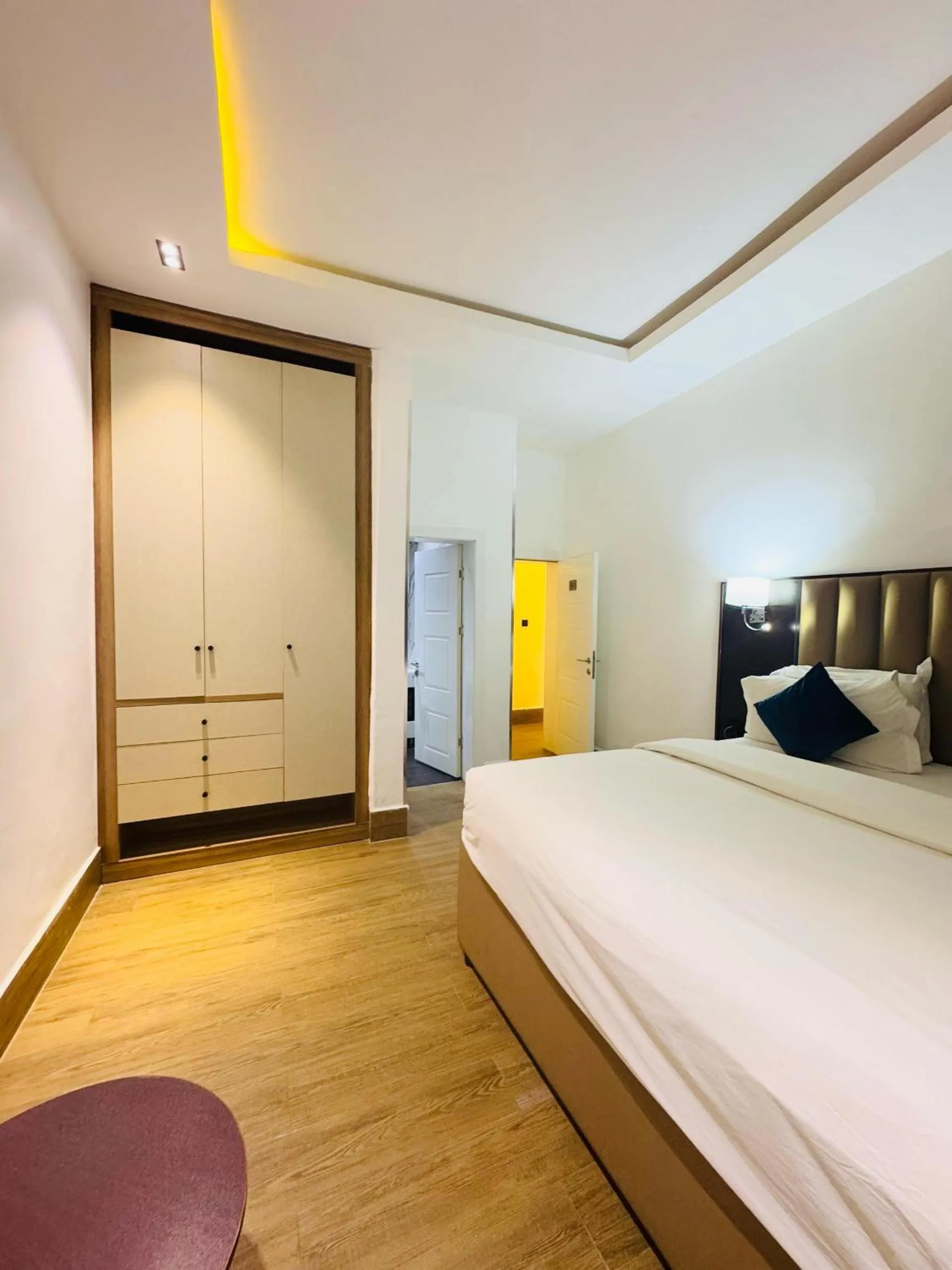 Bed in Bolton White Residence