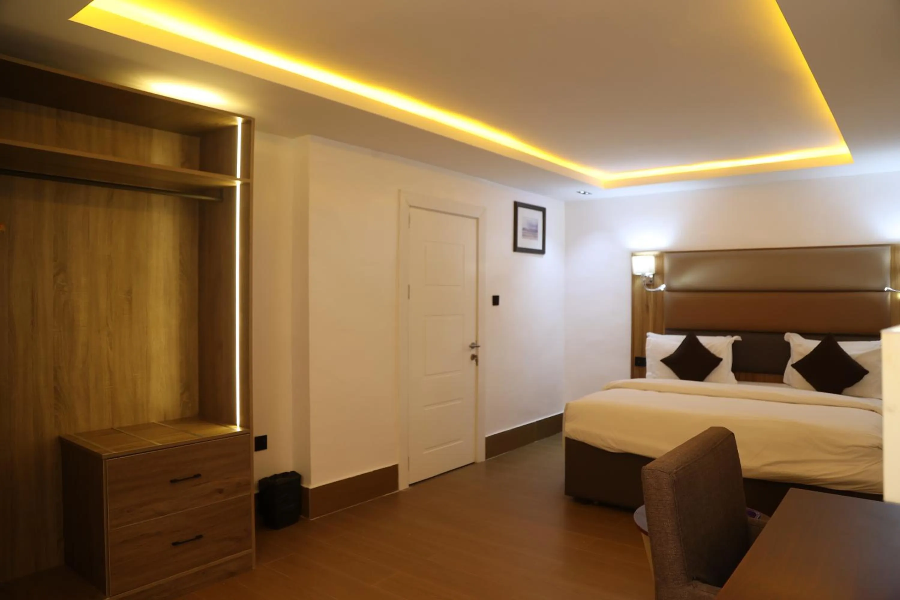 Bed in Bolton White Residence