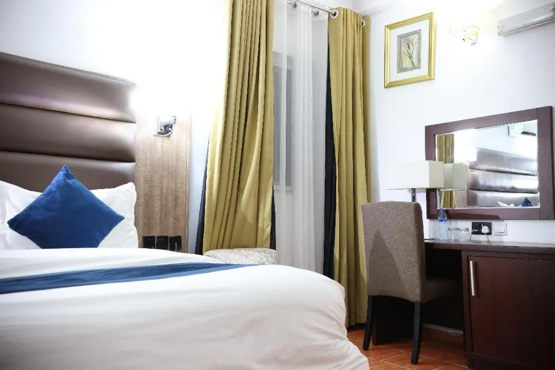 Bed in Bolton White Residence