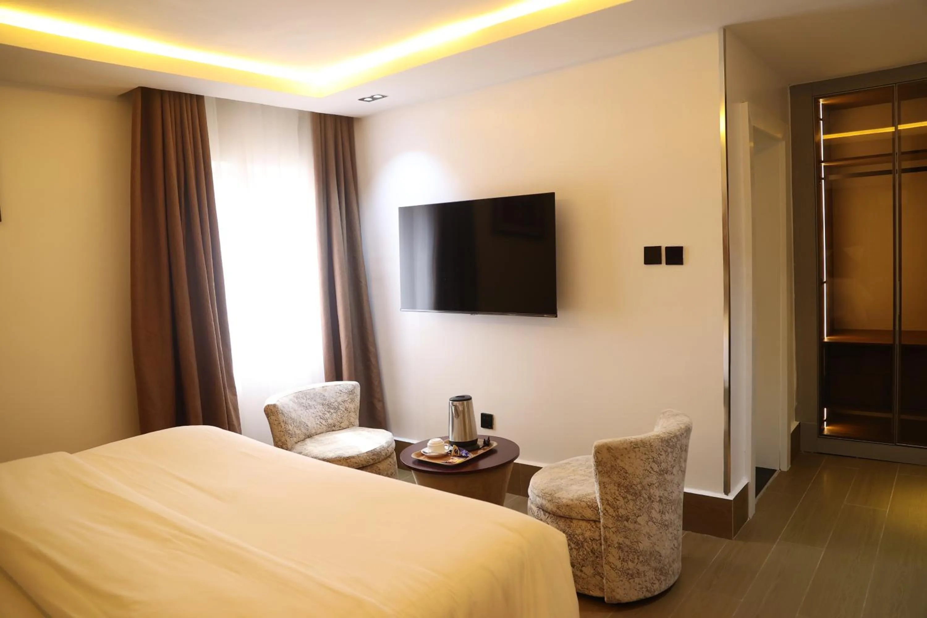 Bed in Bolton White Residence