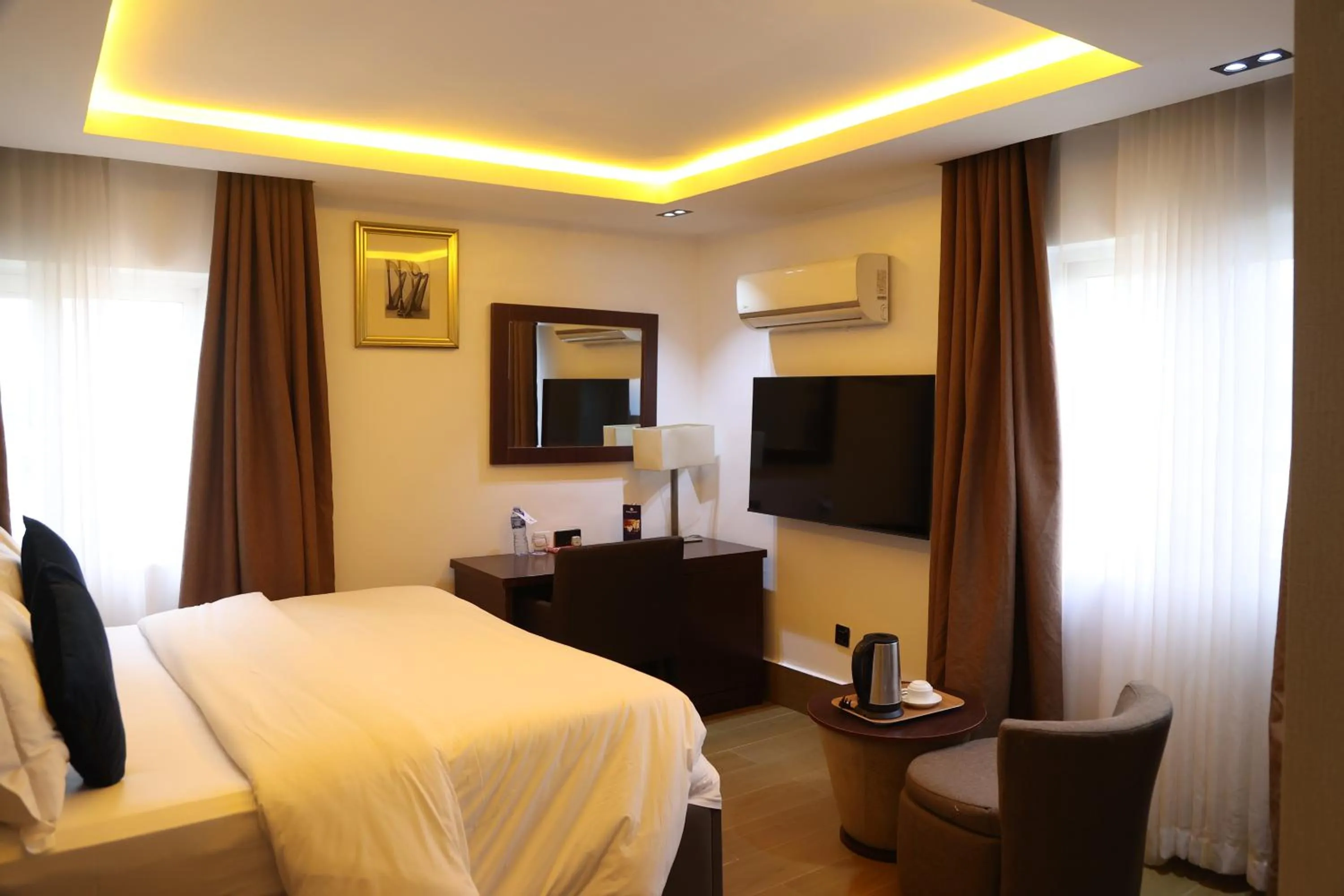 Bed in Bolton White Residence