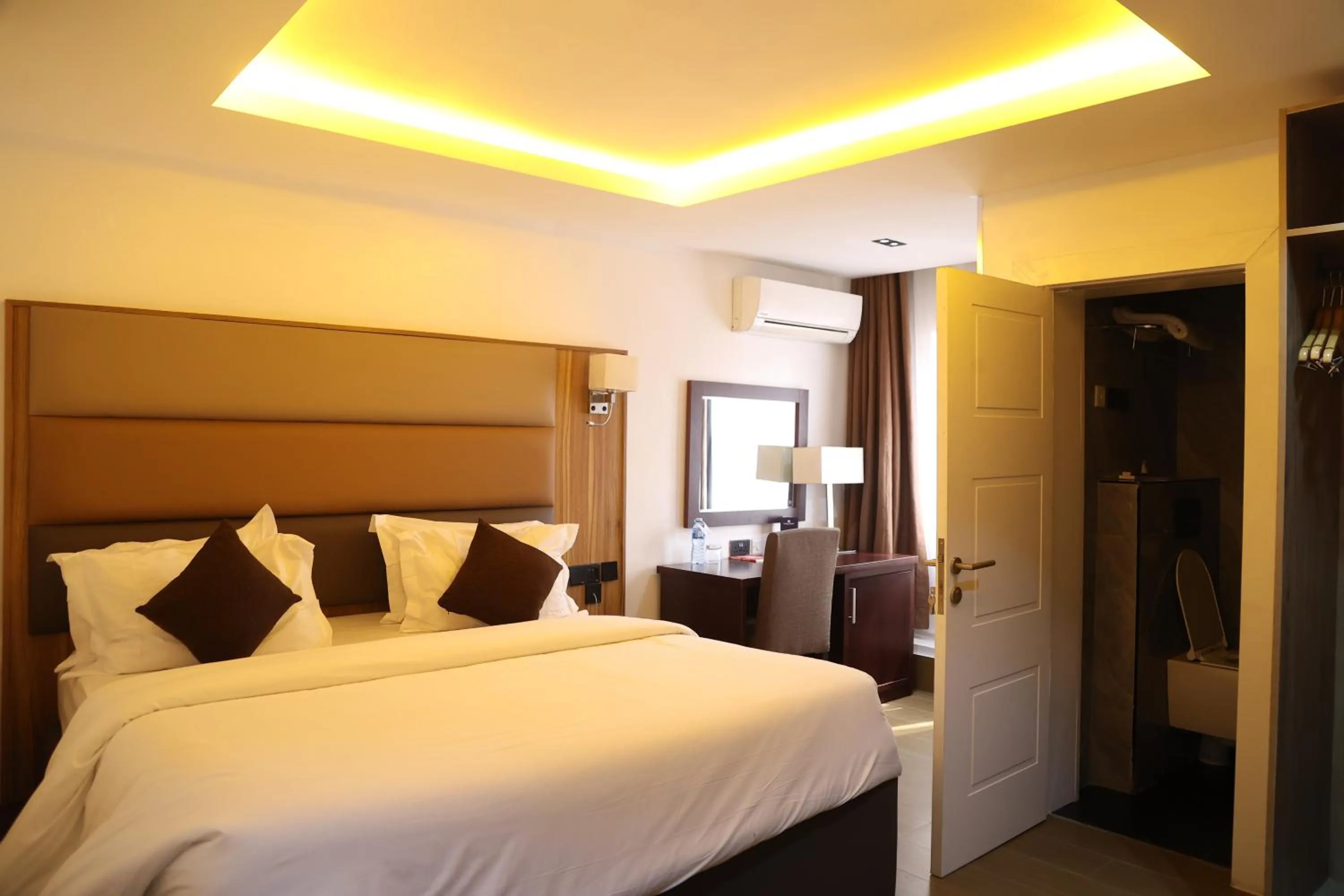 Bed in Bolton White Residence