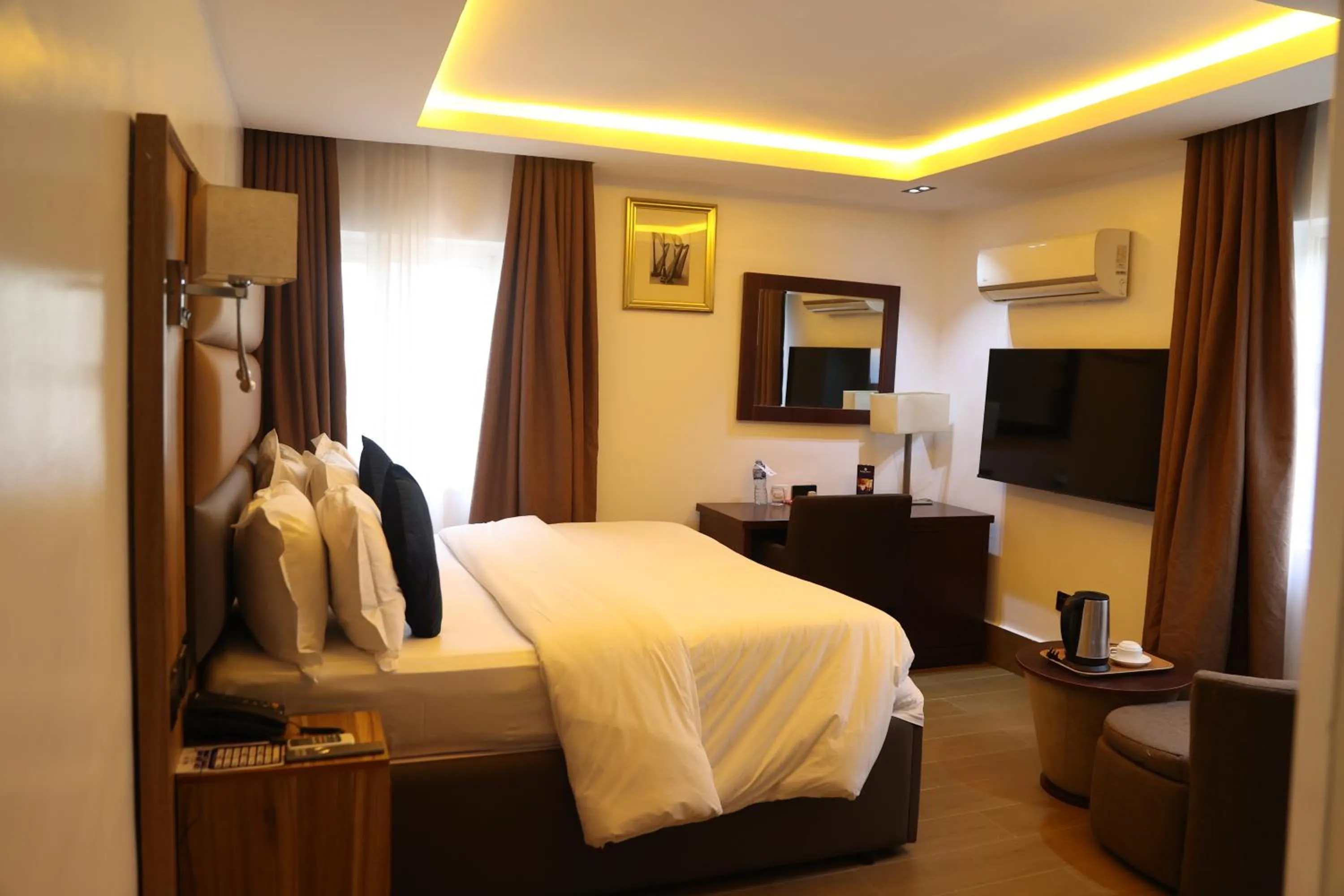 Bed in Bolton White Residence