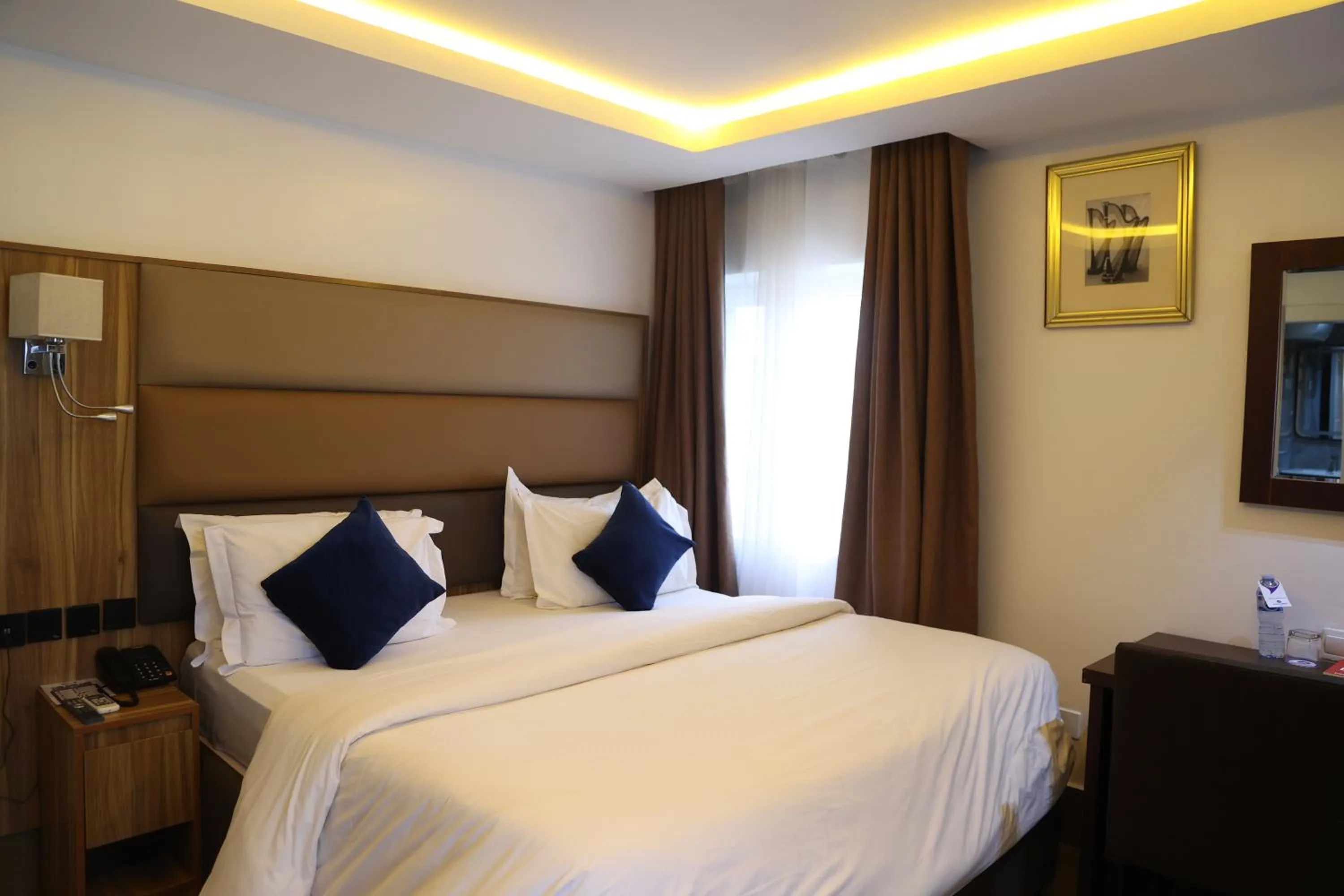 Bed in Bolton White Residence