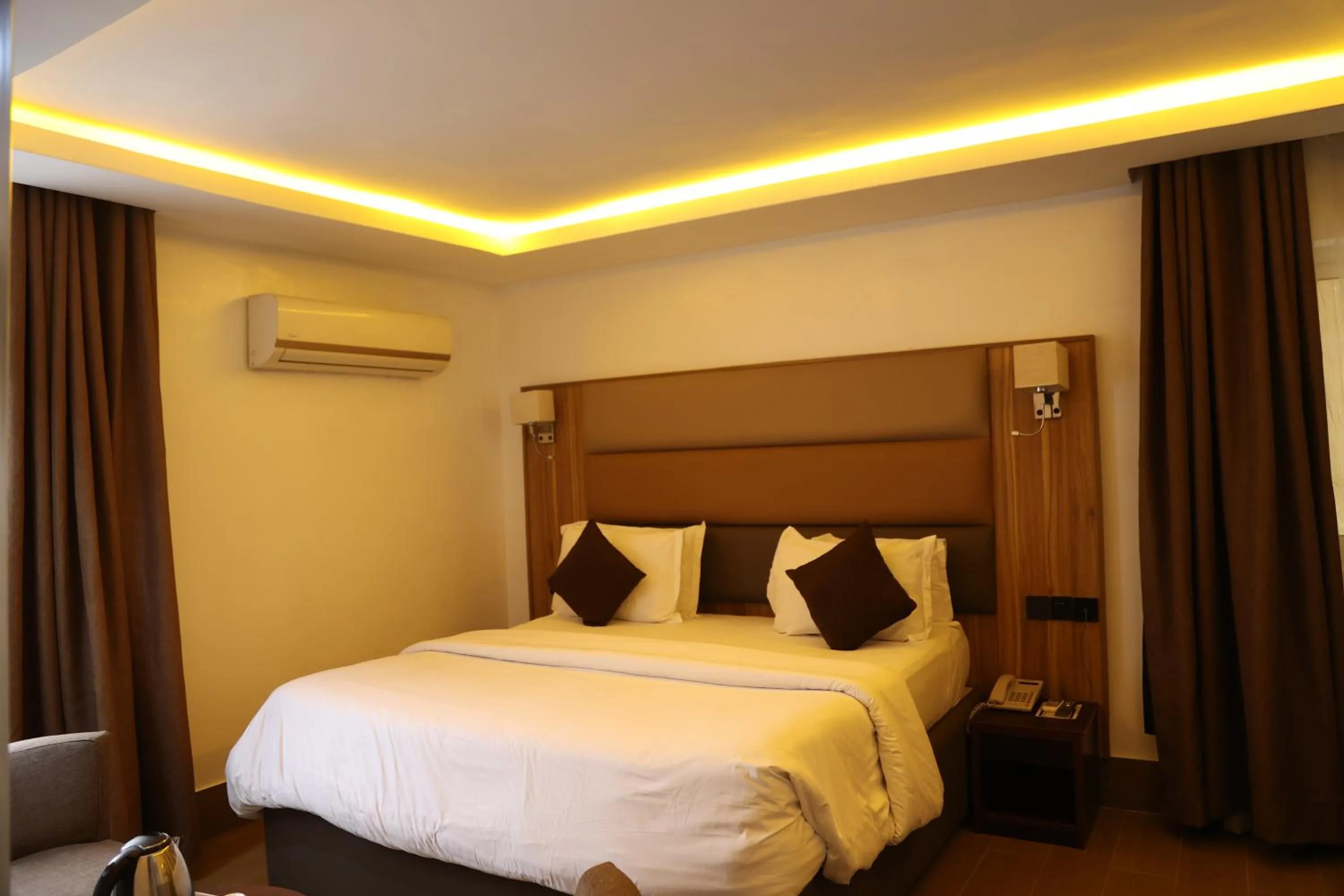 Bed in Bolton White Residence