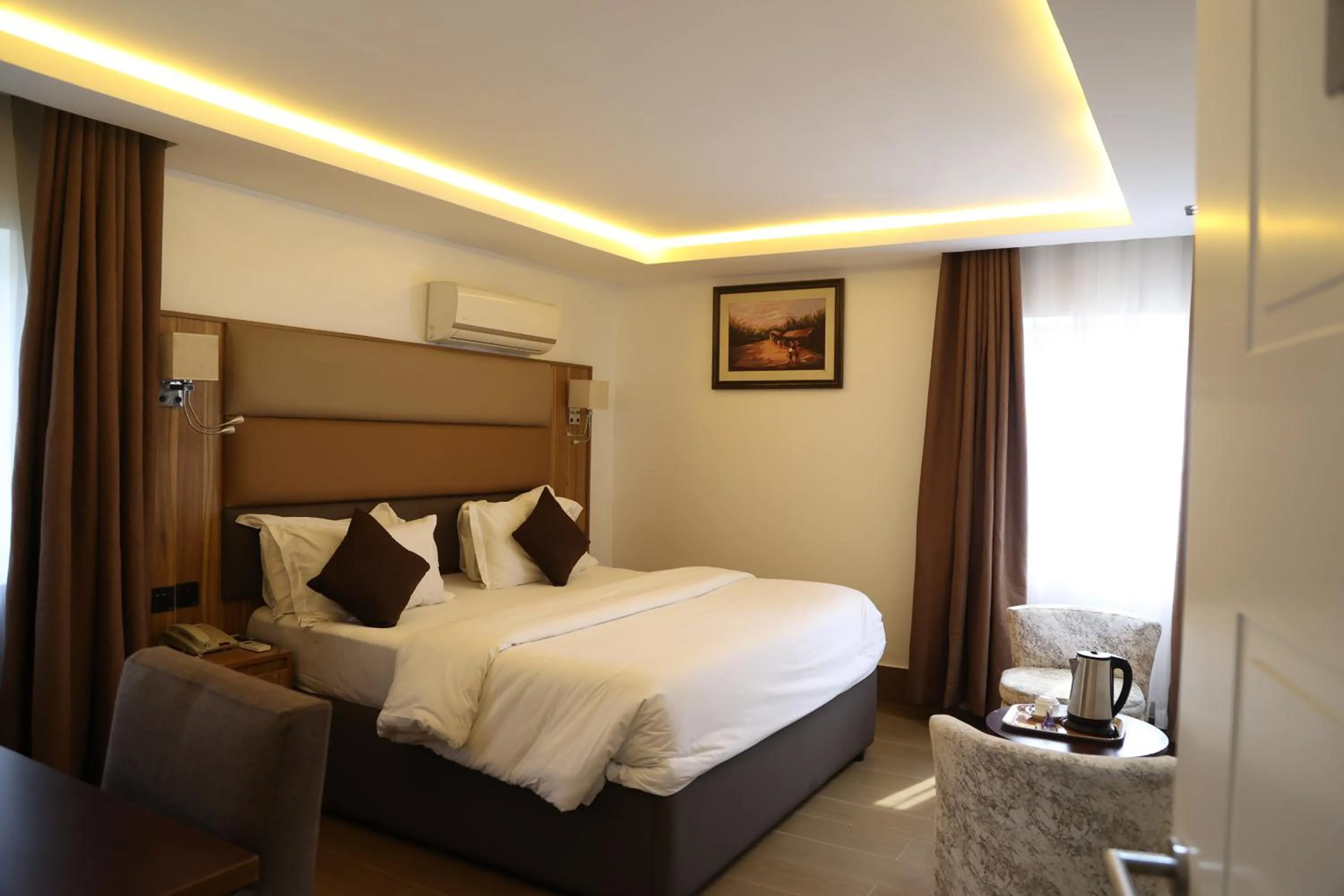 Bed in Bolton White Residence