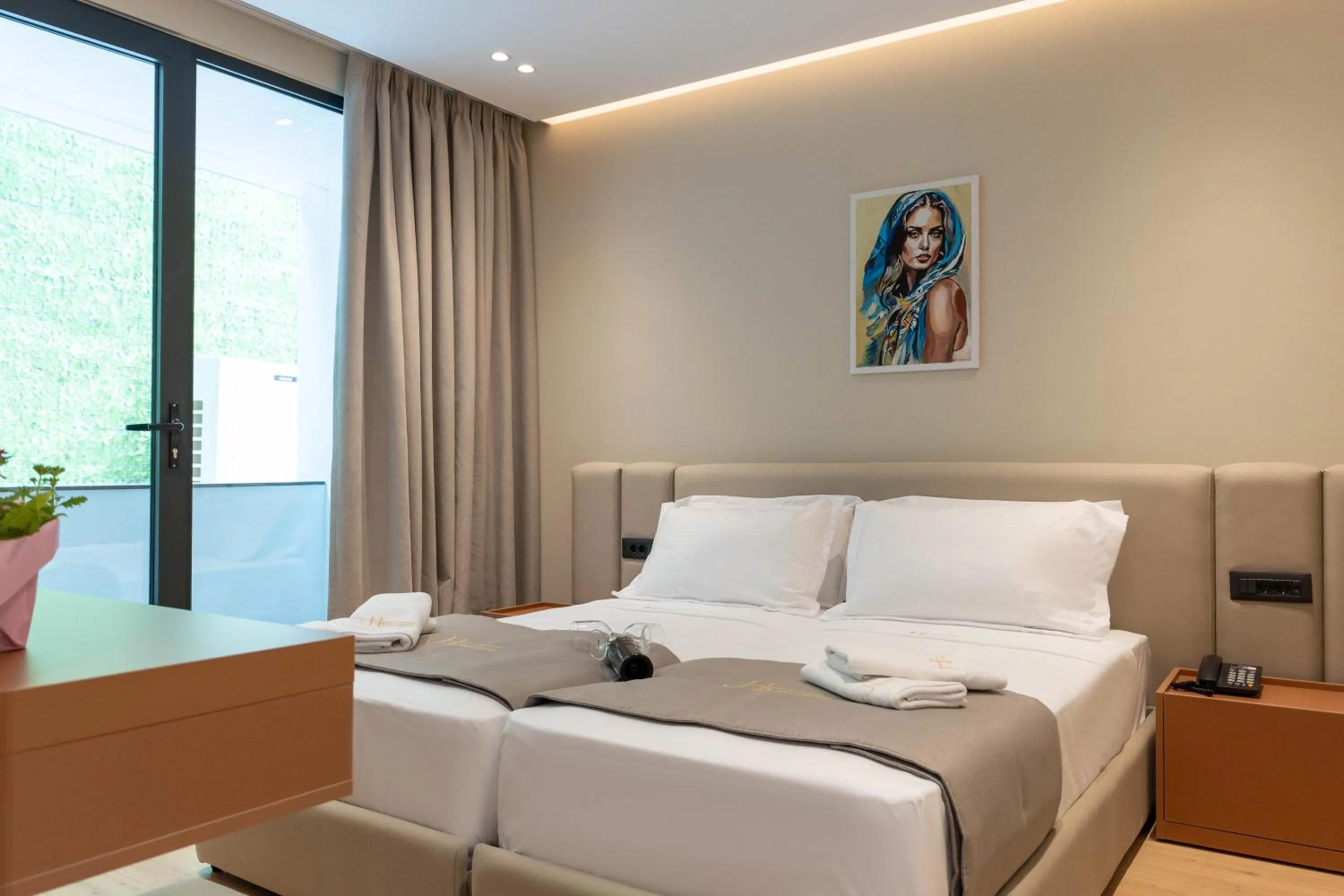 Bed in Jako Premium Hotel