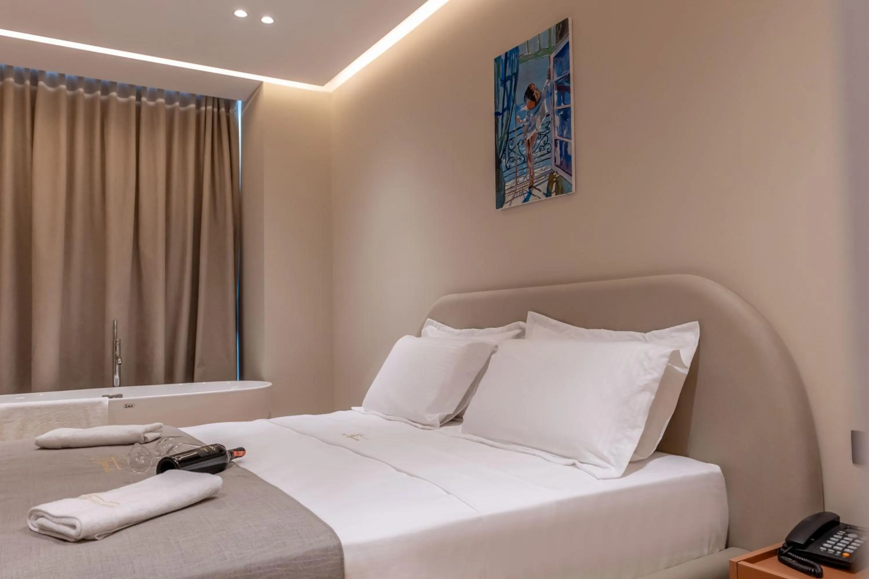 Bed in Jako Premium Hotel