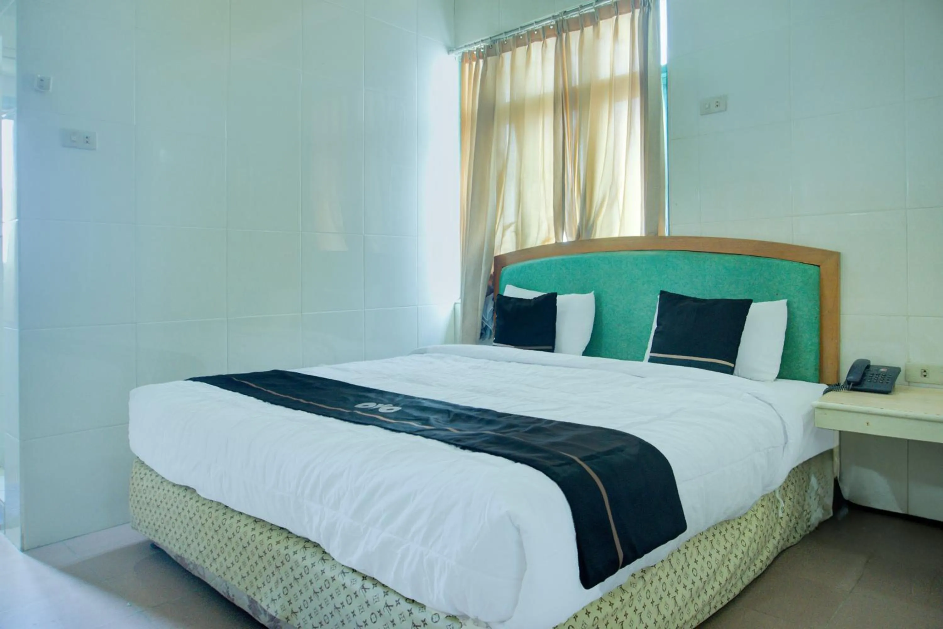 Bedroom, Bed in Townhouse Oak Palembang Near Jembatan Ampera Formerly Azzura Hotel