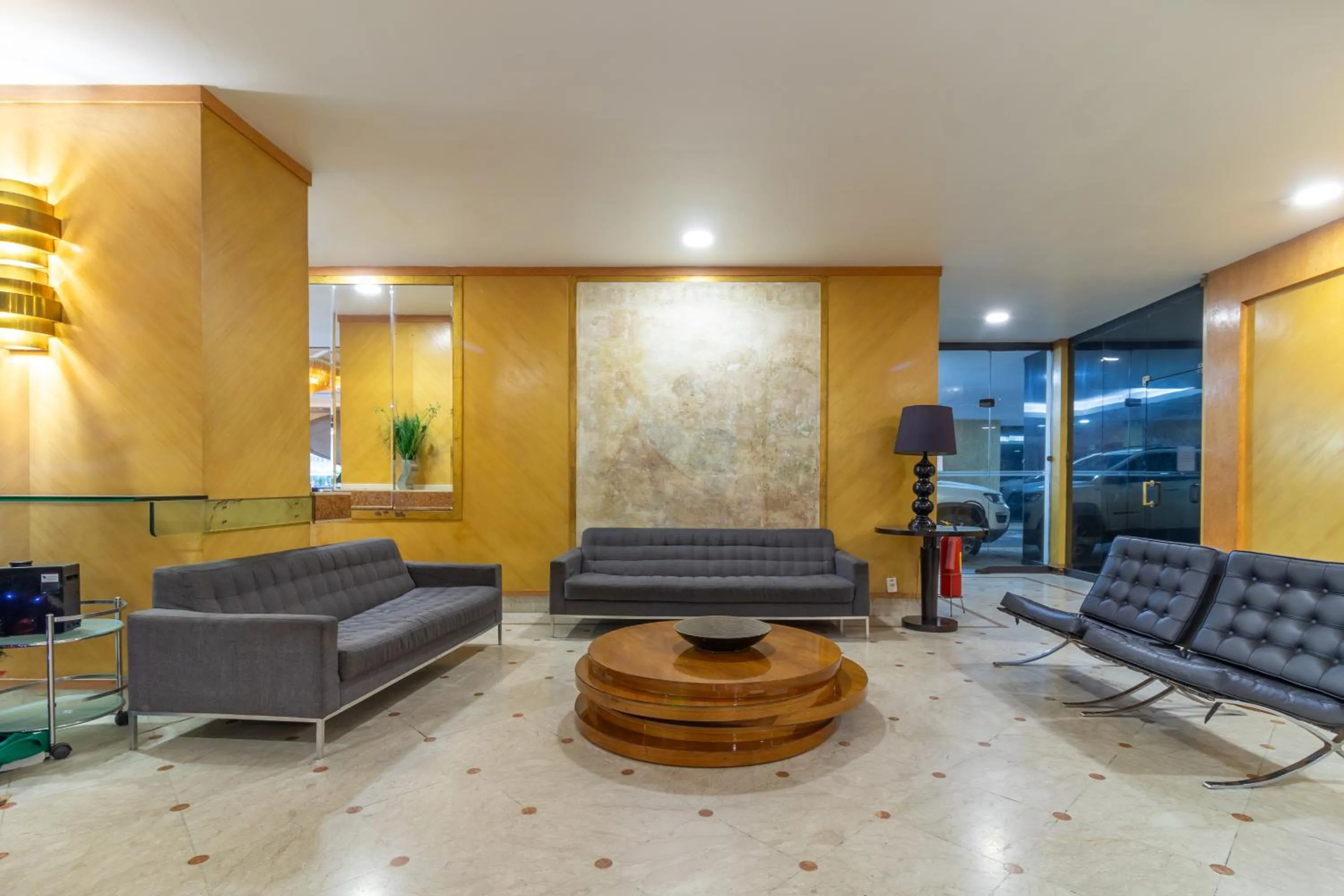 Living room in Gran Villagio Hotel SP by Castelo Itaipava