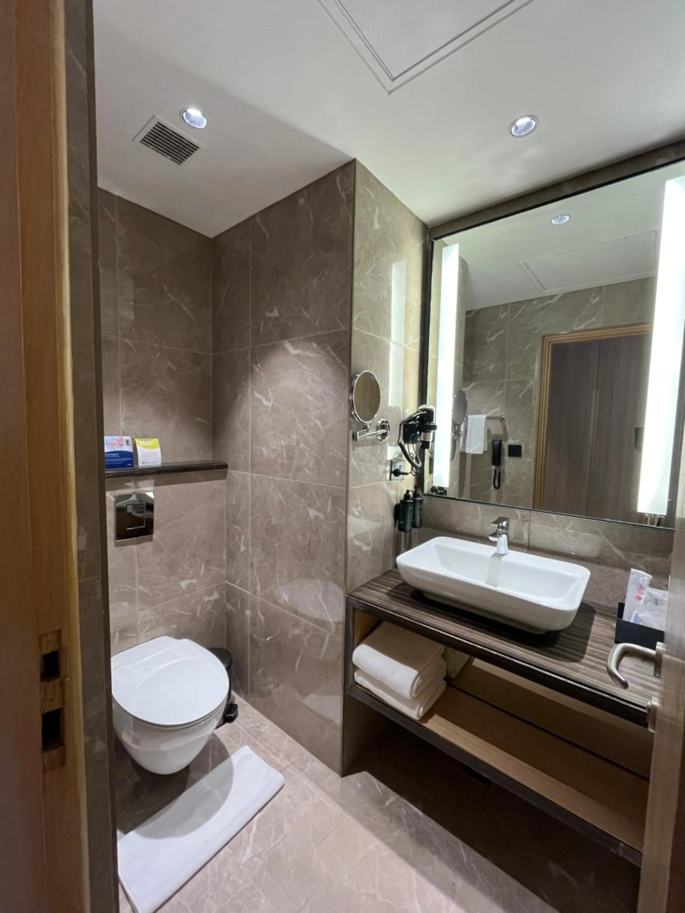 Bathroom in Ramada Encore by Wyndham Gurugram Dwarka Expressway