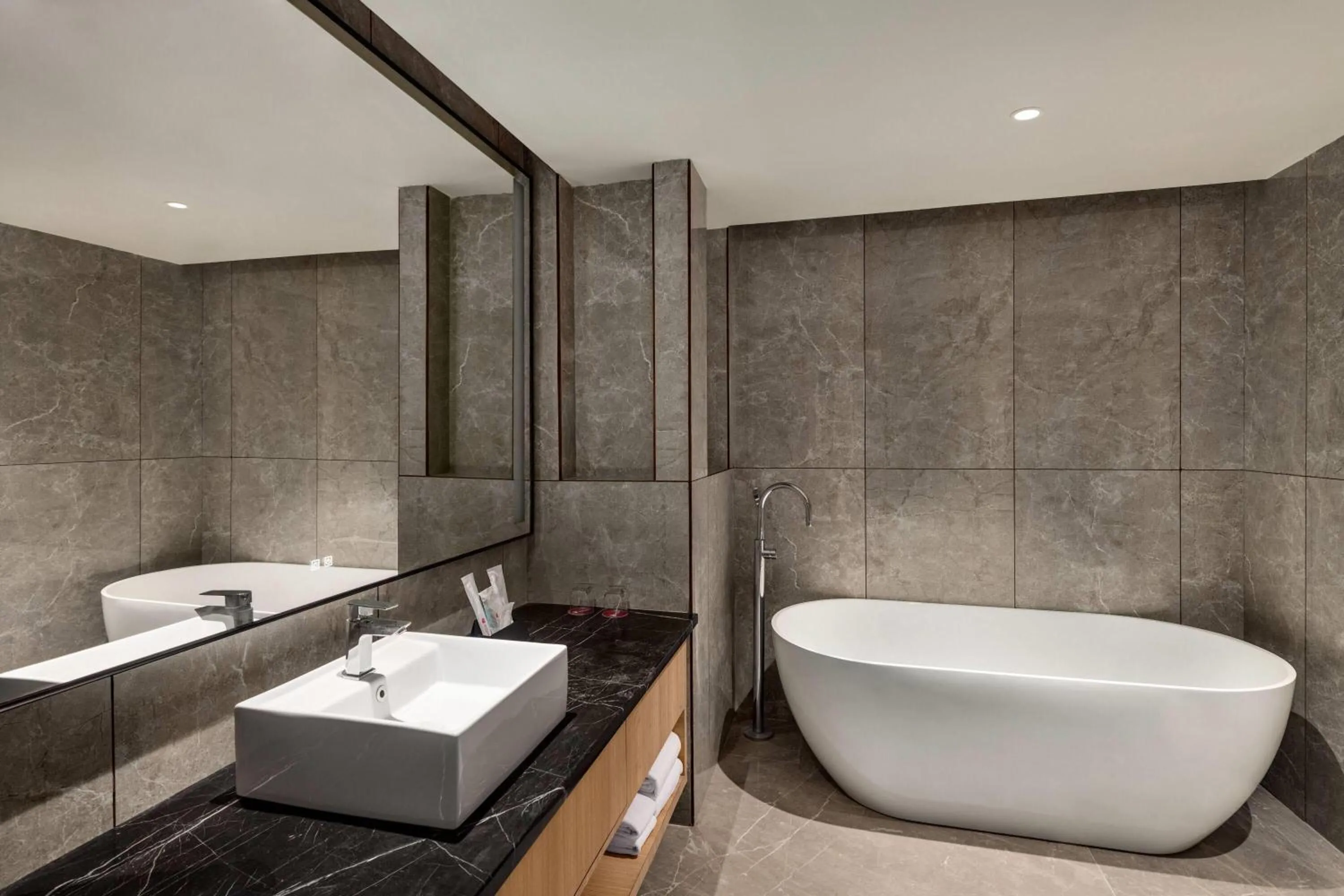 Bathroom in Ramada Encore by Wyndham Gurugram Dwarka Expressway