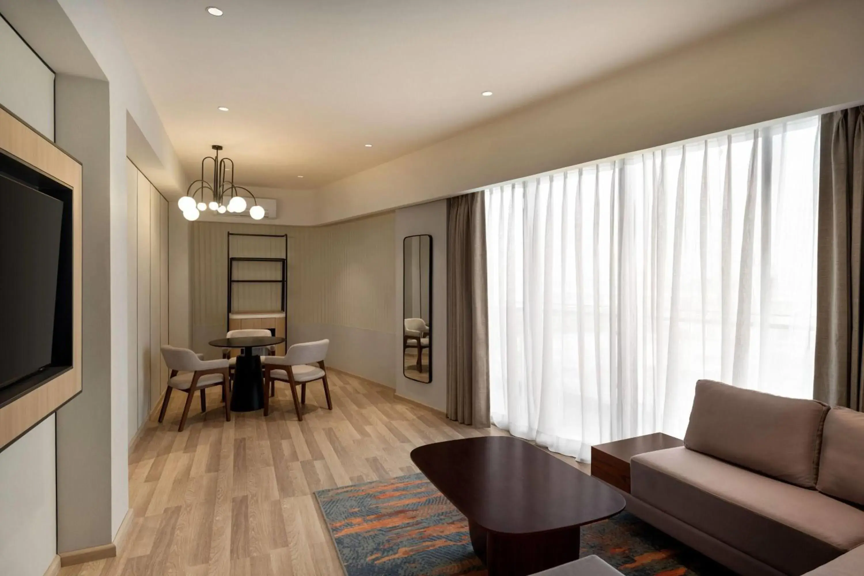 Photo of the whole room in Ramada Encore by Wyndham Gurugram Dwarka Expressway Photo of the whole room in Ramada Encore by Wyndham Gurugram Dwarka Expressway