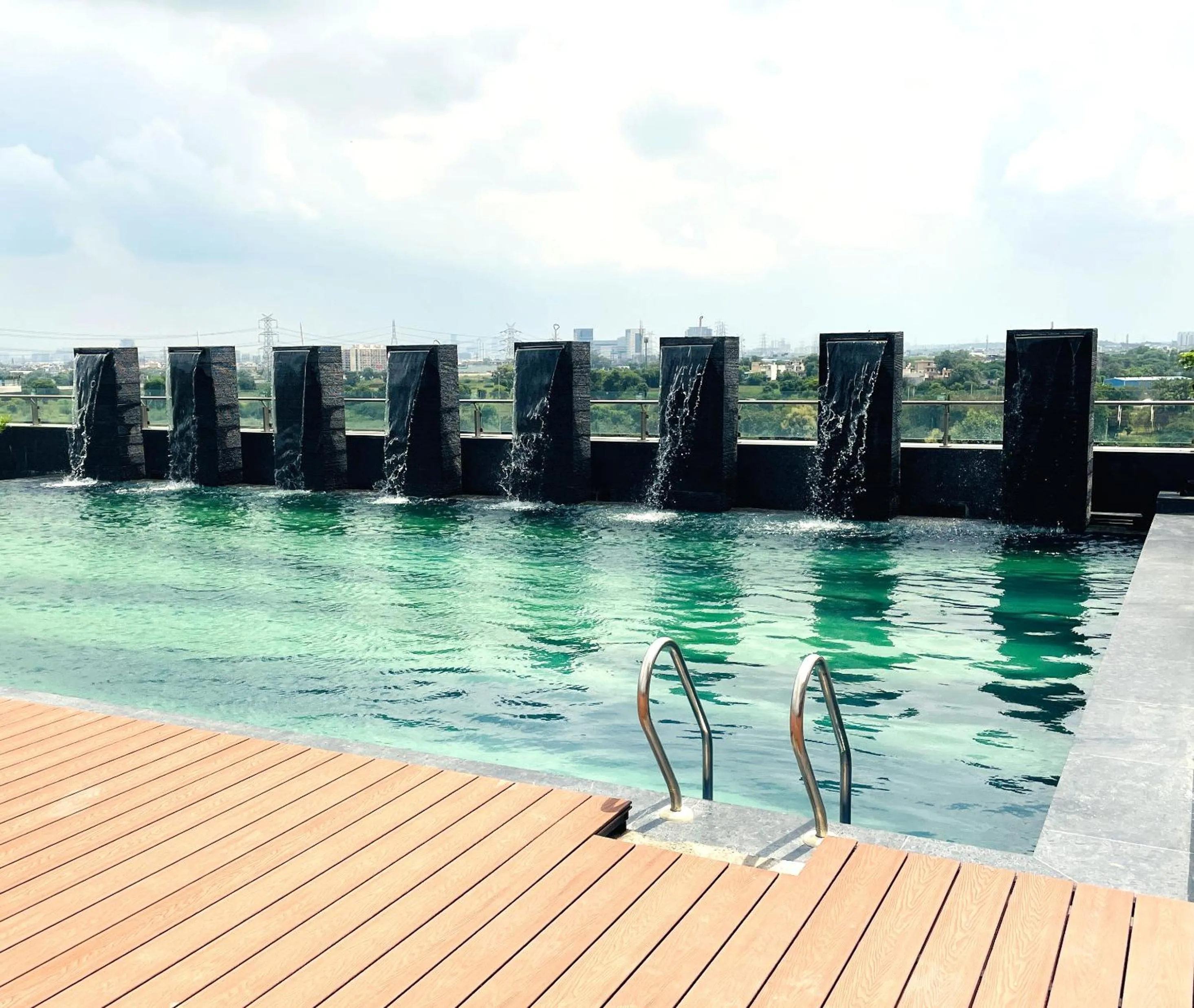 Swimming pool in Ramada Encore by Wyndham Gurugram Dwarka Expressway