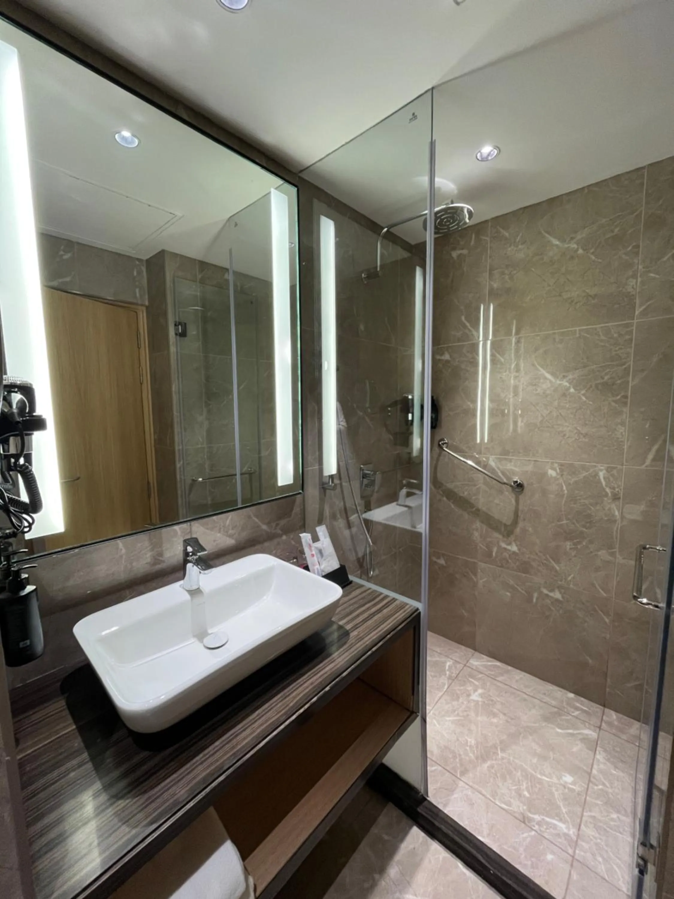 Bathroom in Ramada Encore by Wyndham Gurugram Dwarka Expressway