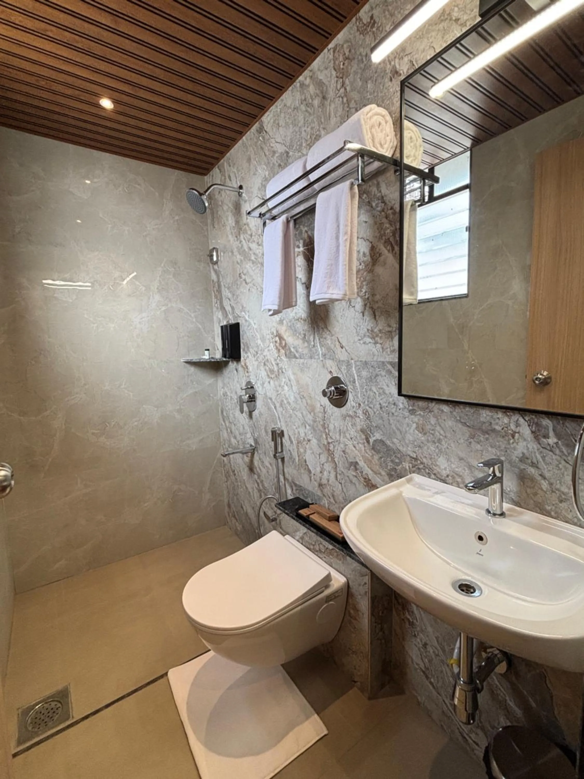 Bathroom in Mastiff Hotel Hinjawadi Pune