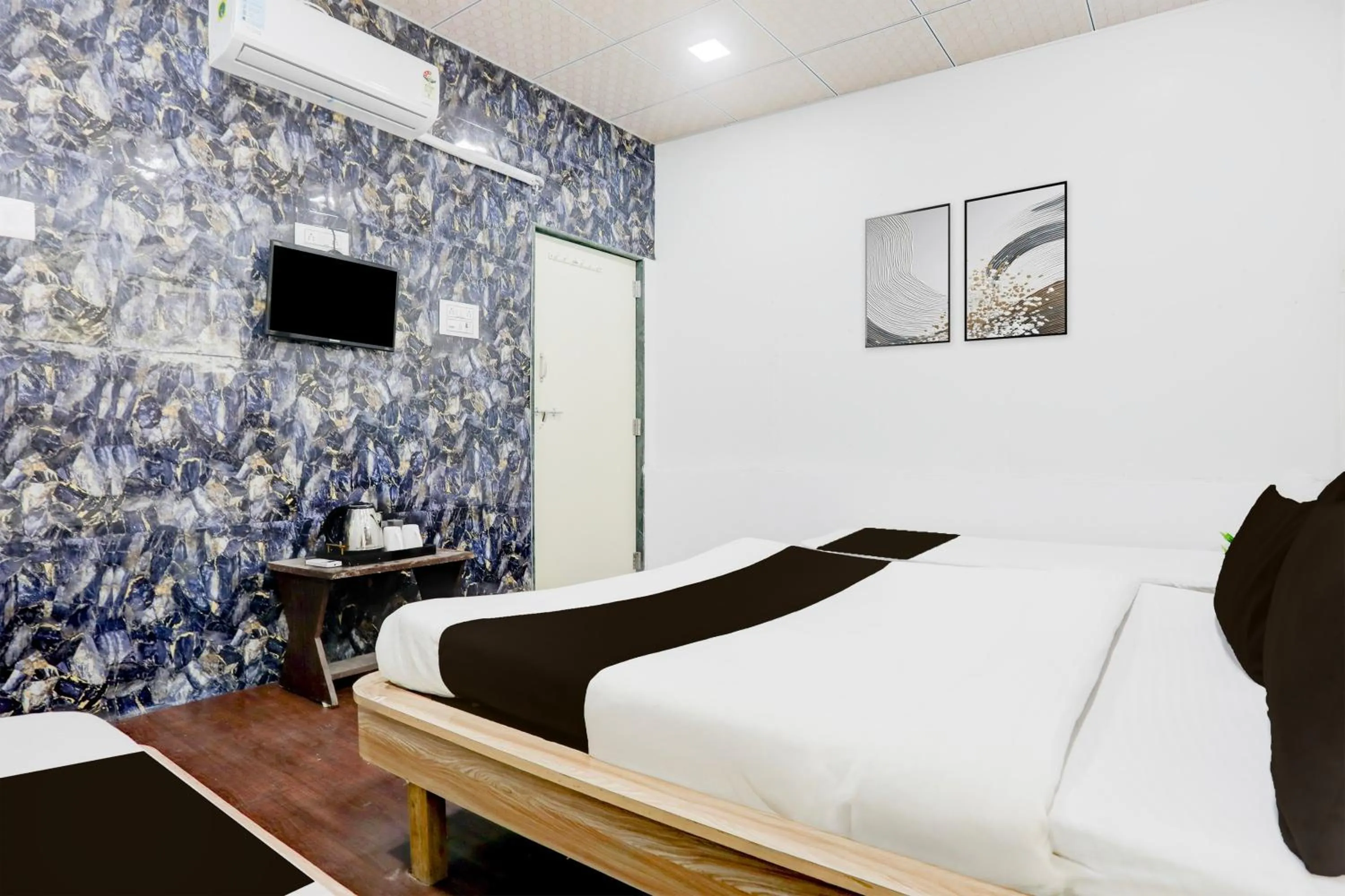 Bedroom in Hotel O Dwarka Formerly Hotel Shree