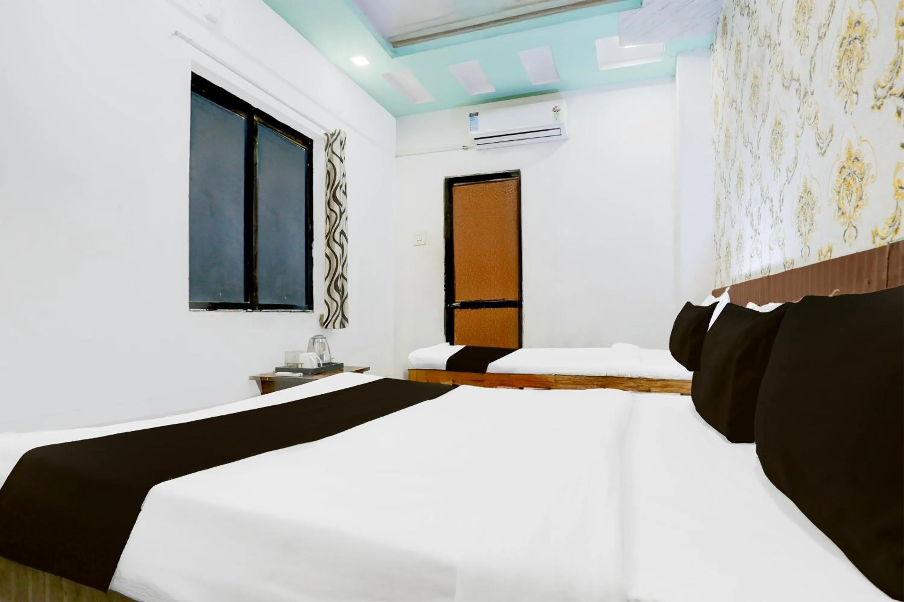 Bedroom in Hotel O Dwarka Formerly Hotel Shree