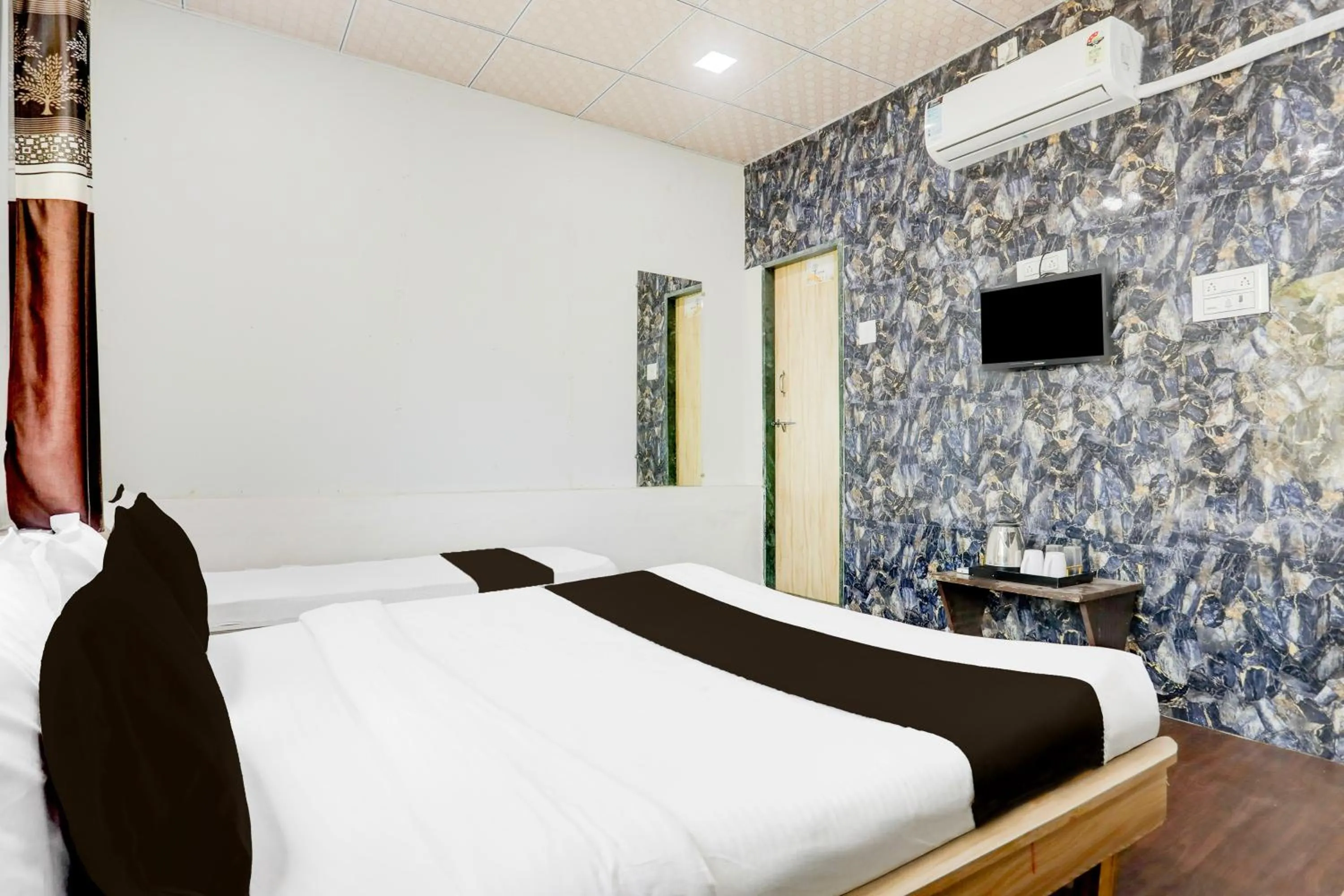 Bedroom in Hotel O Dwarka Formerly Hotel Shree