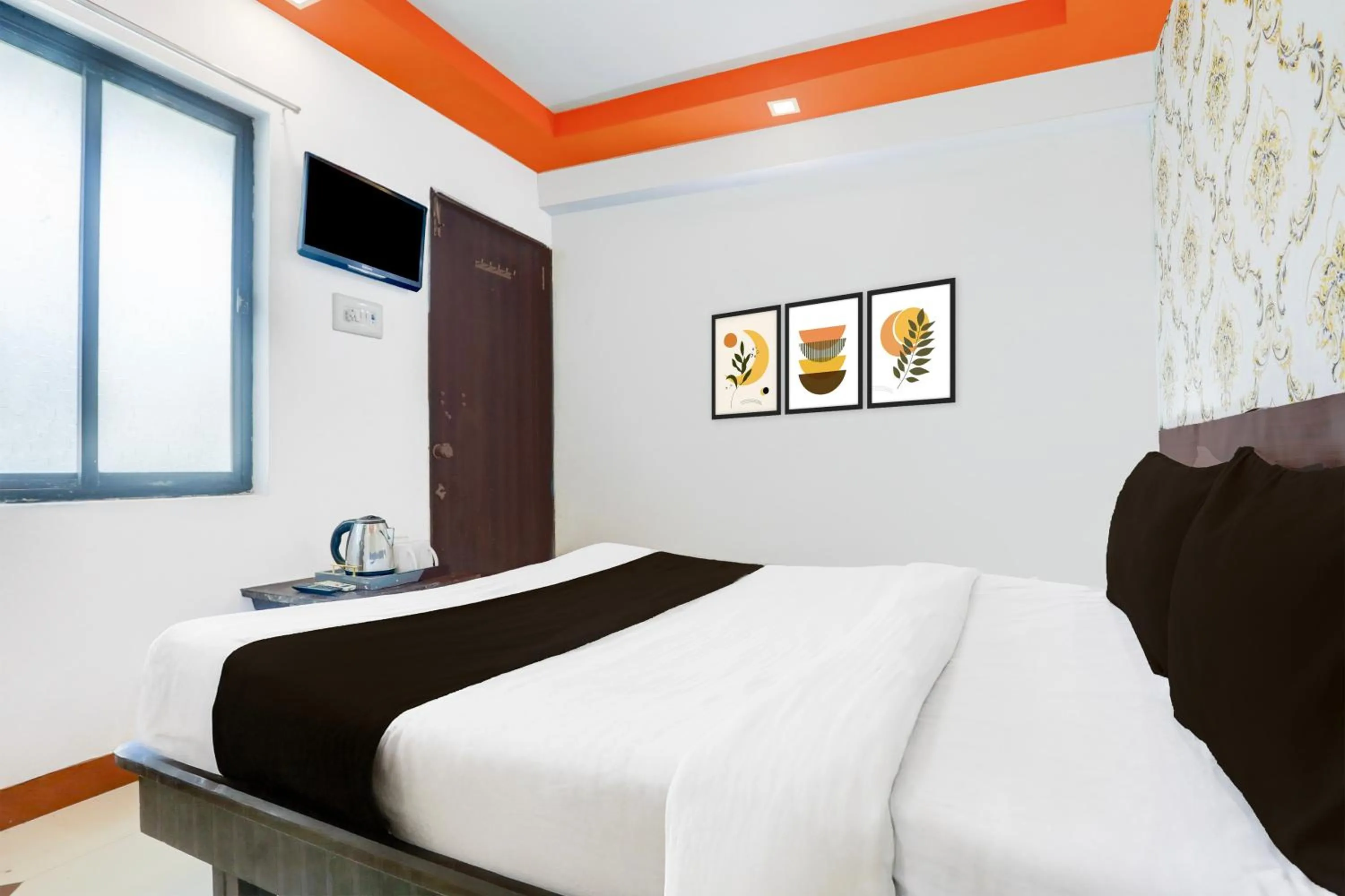 Bedroom in Hotel O Dwarka Formerly Hotel Shree