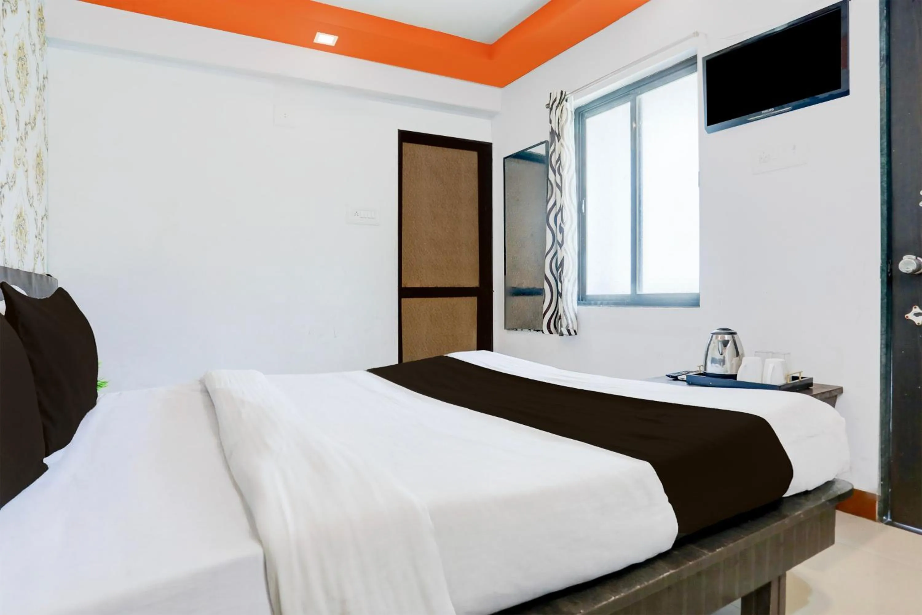 Bedroom in Hotel O Dwarka Formerly Hotel Shree