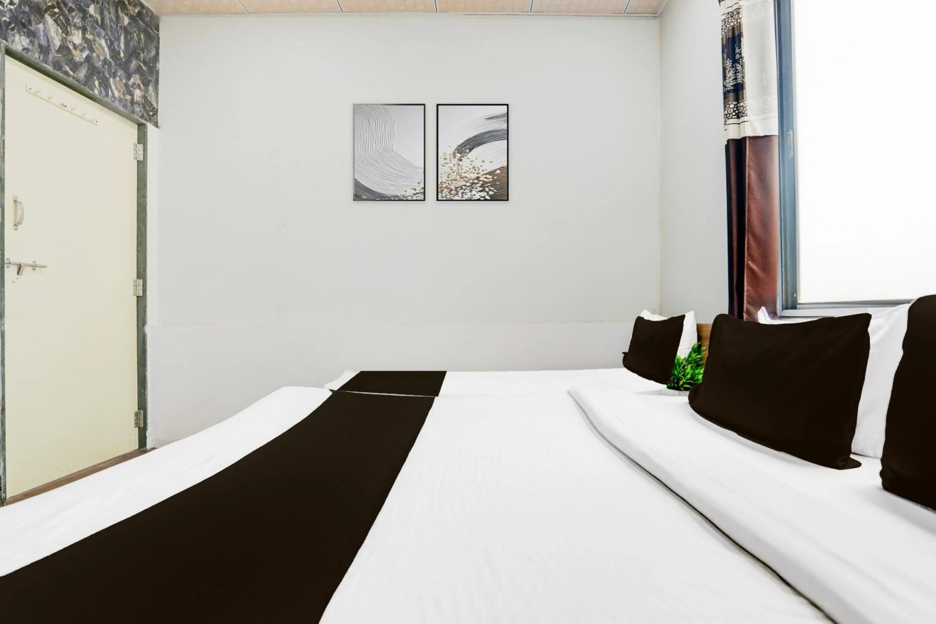 Bedroom in Hotel O Dwarka Formerly Hotel Shree