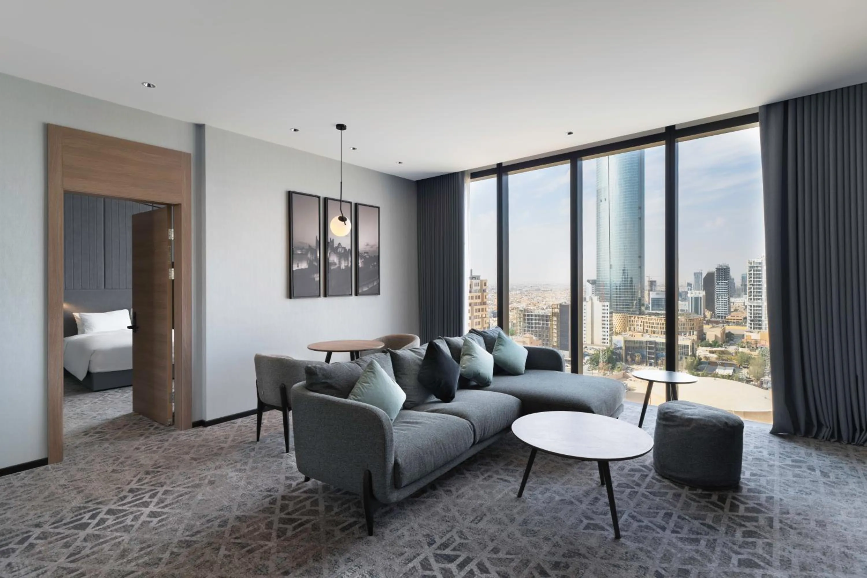 Living room, Bed in Radisson Blu Hotel, Riyadh Al Sahafa