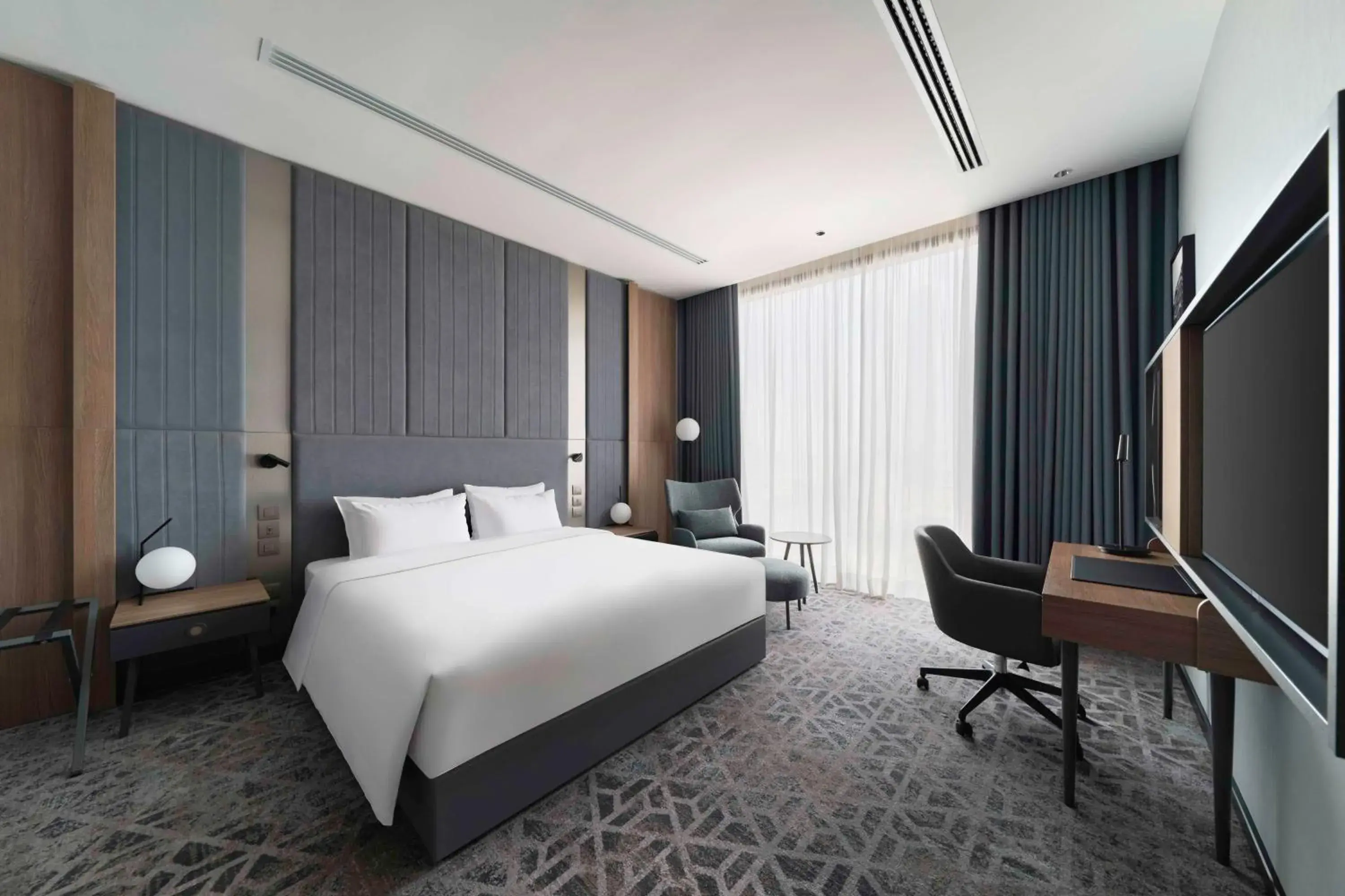 Bedroom, Bed in Radisson Blu Hotel, Riyadh Al Sahafa Bedroom, Bed in Radisson Blu Hotel, Riyadh Al Sahafa