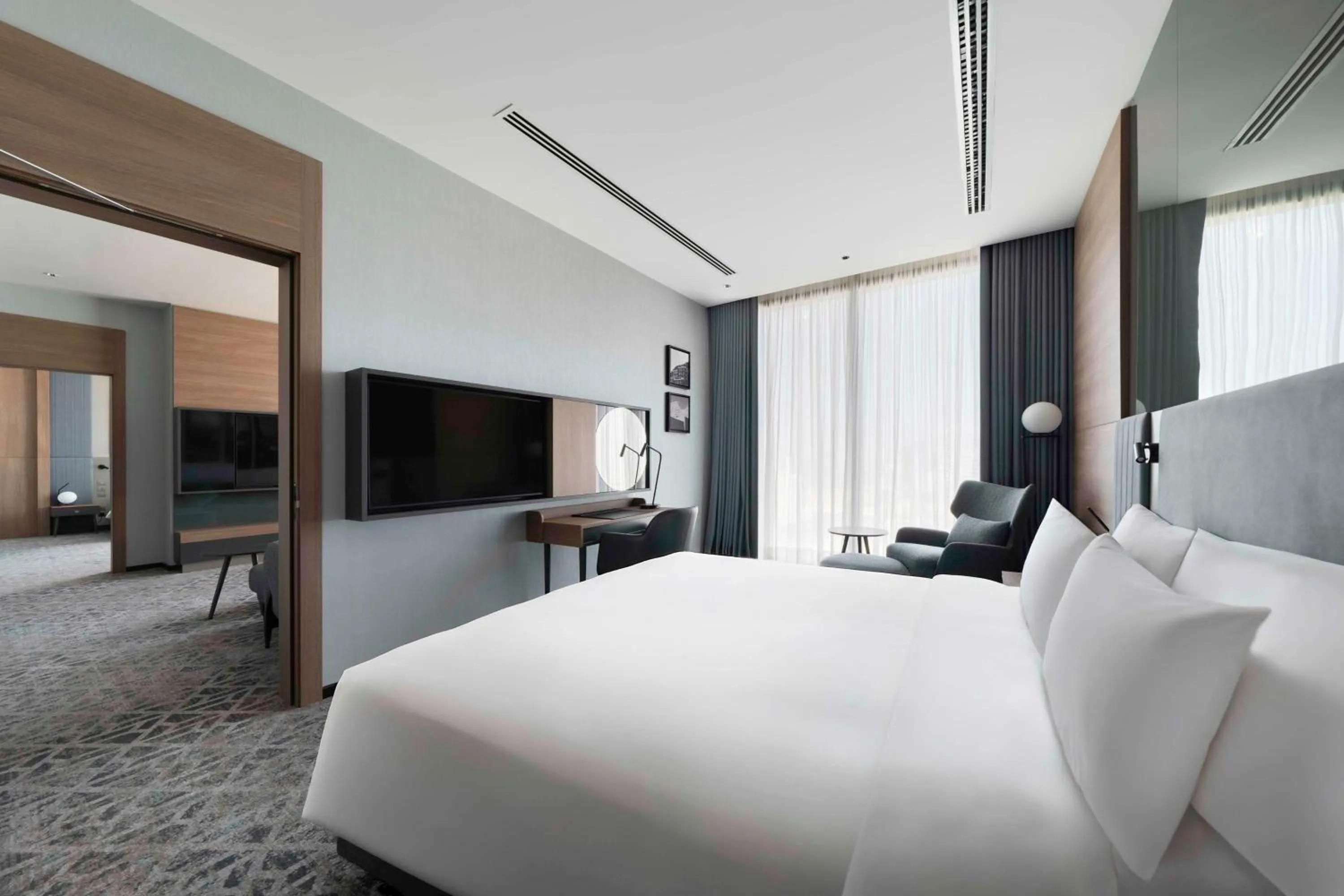 Photo of the whole room, Bed in Radisson Blu Hotel, Riyadh Al Sahafa