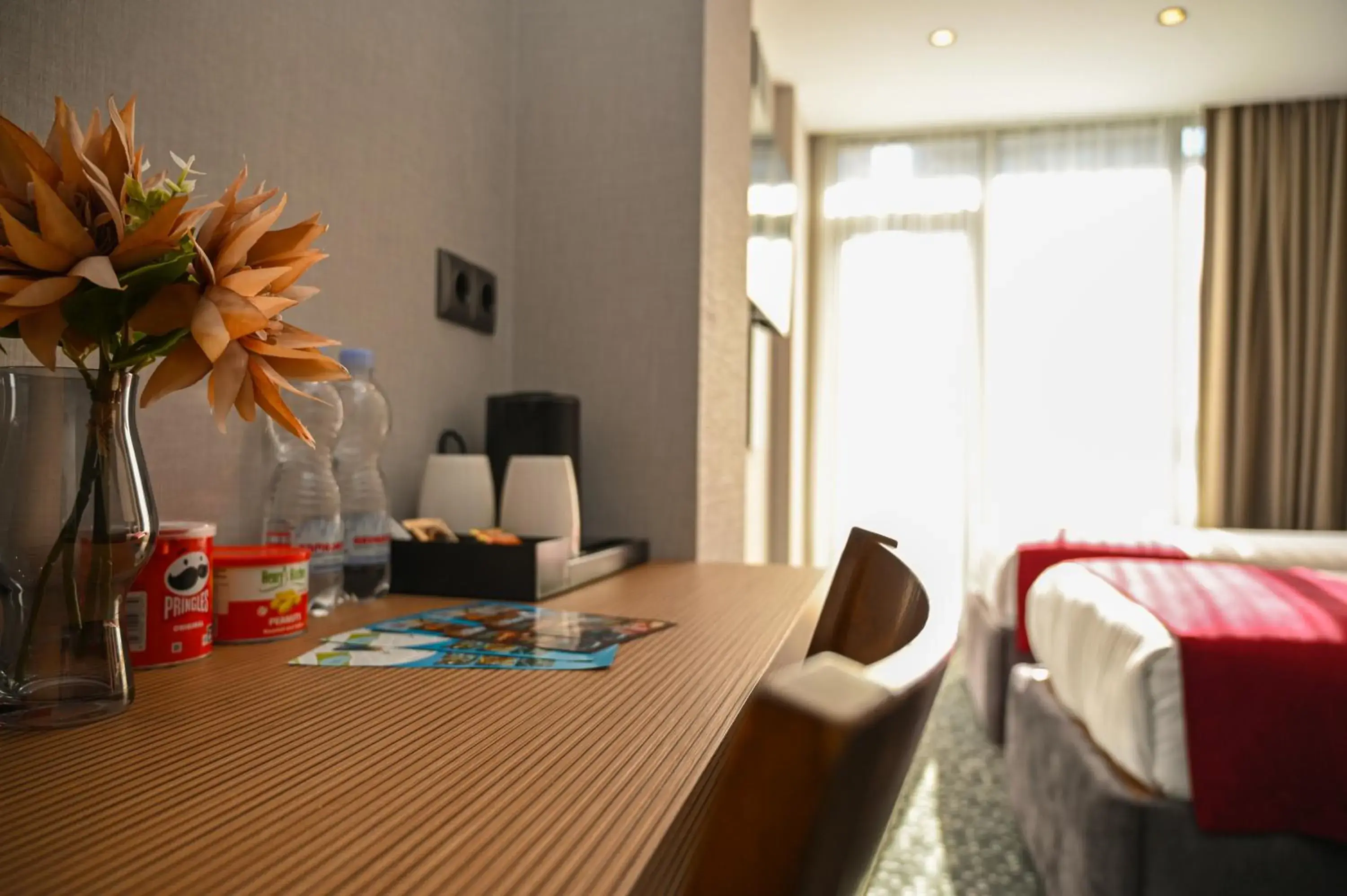 Seating area, Bed in Landmark Hotel Seating area, Bed in Landmark Hotel